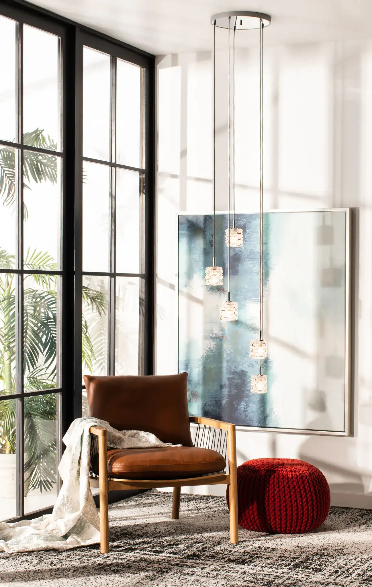 Hadden Five-Light Pendant in Silver / Glass in a styled room