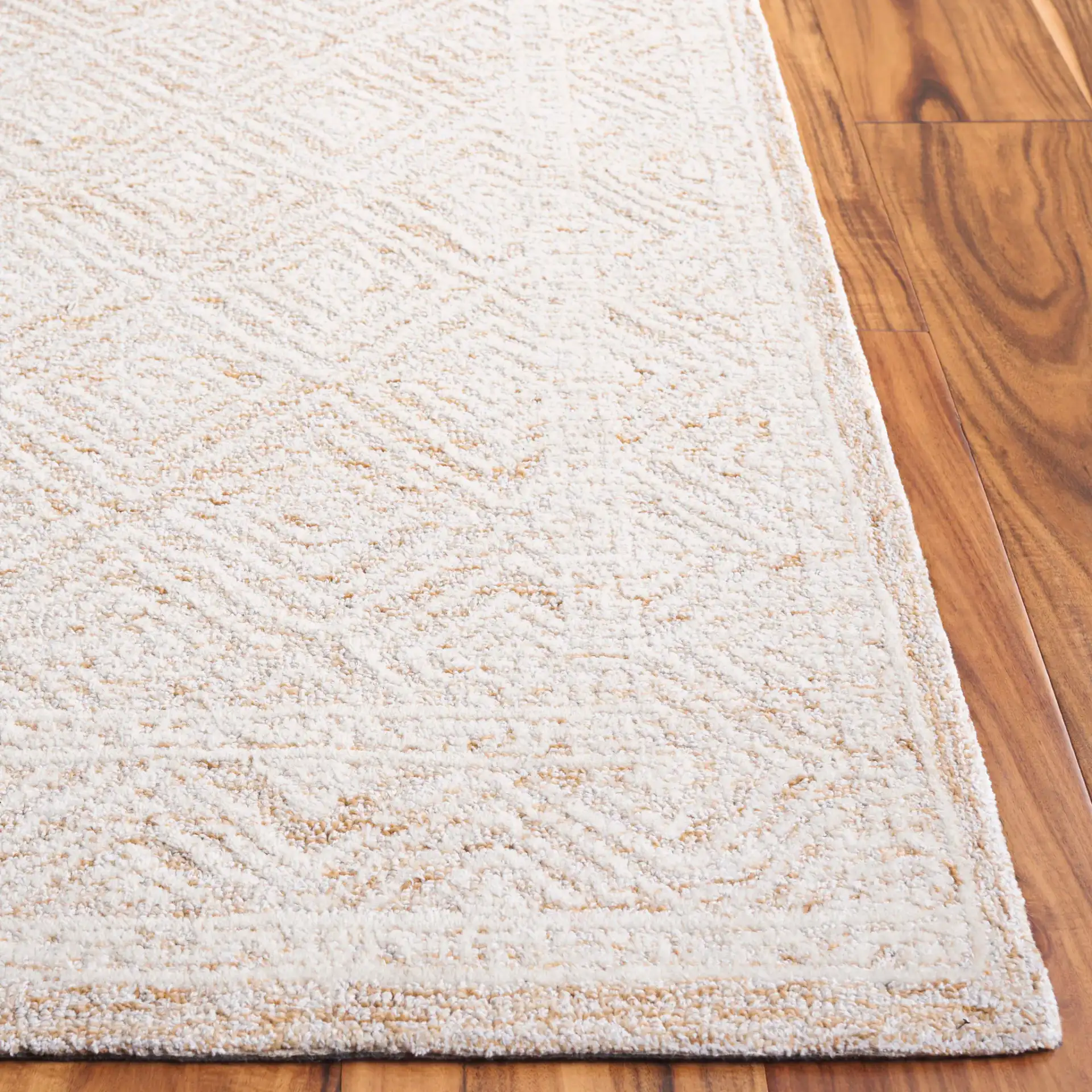 Pine Nested Diamond Hand-Tufted Wool Rug in Ivory / Orange in a styled room