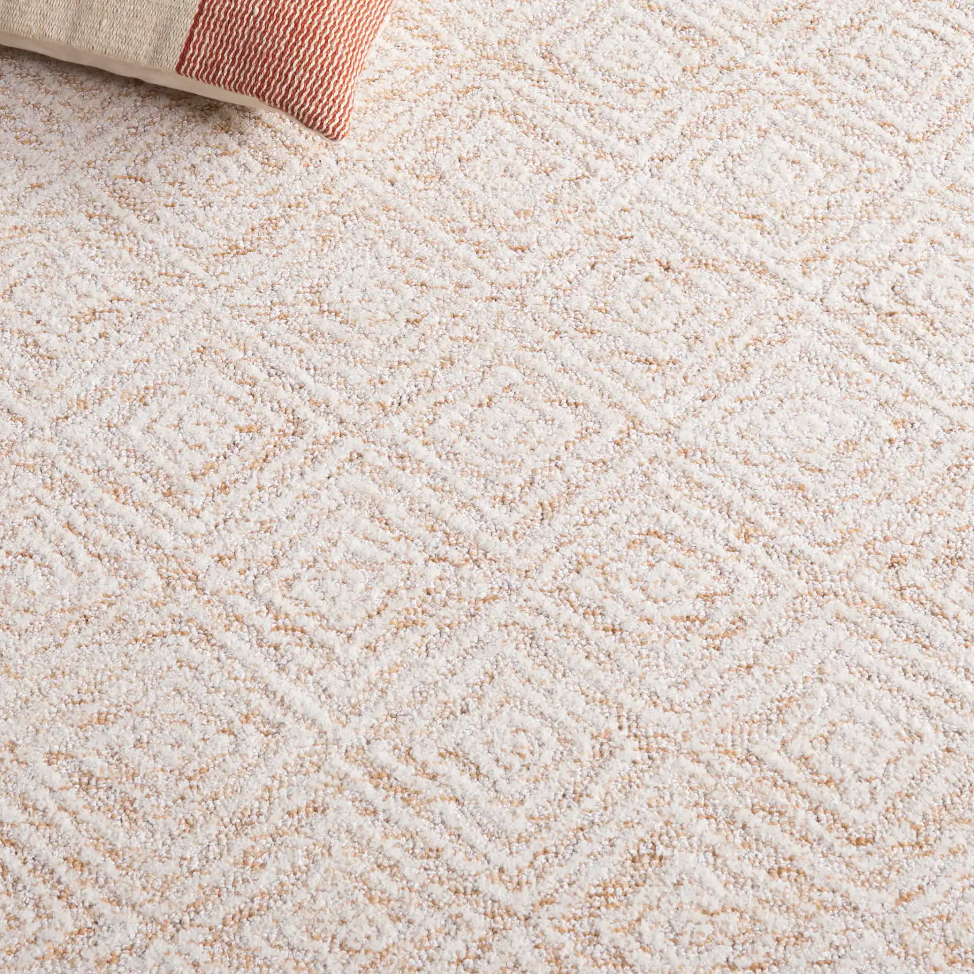 Pine Nested Diamond Hand-Tufted Wool Rug in Ivory / Orange in a styled room