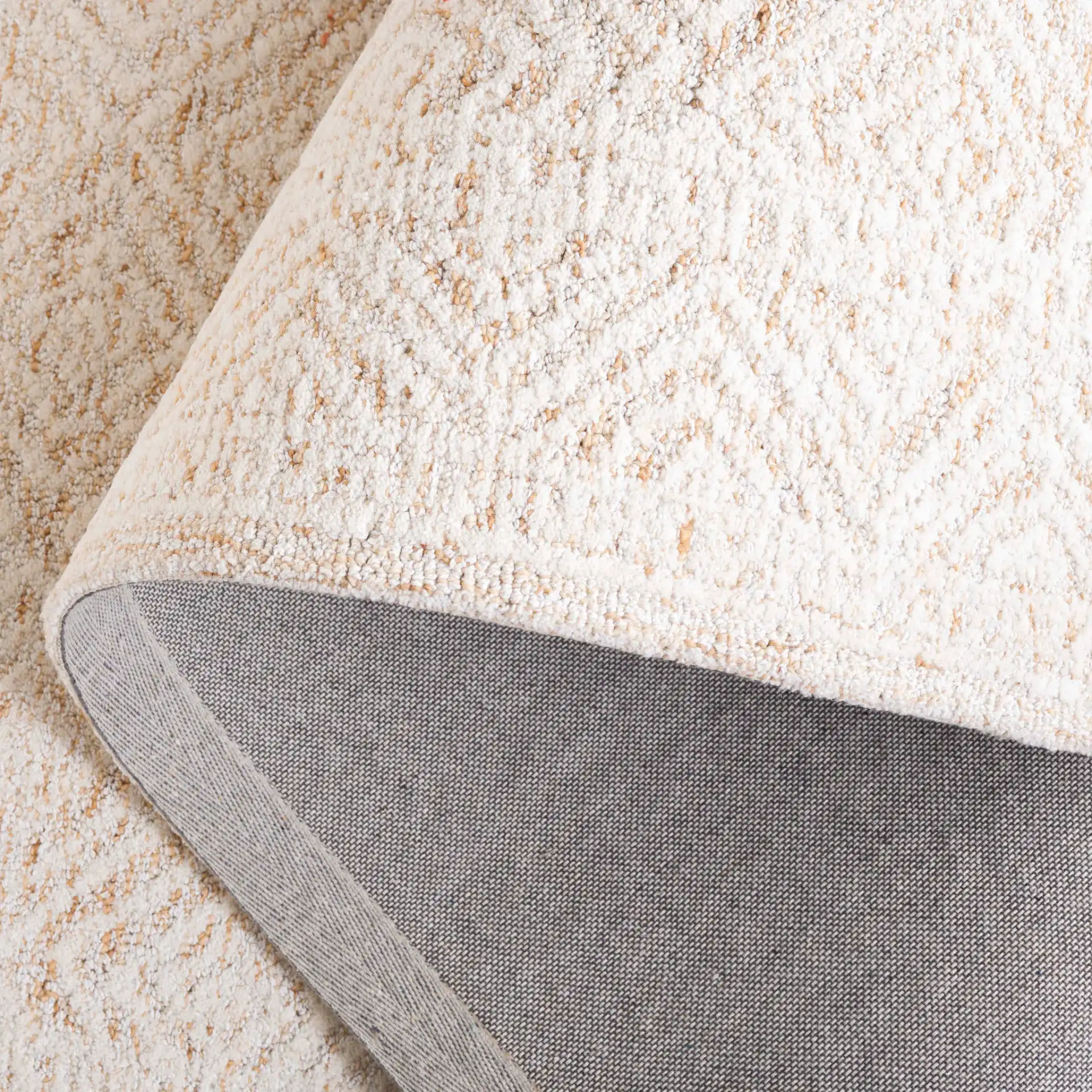 Pine Nested Diamond Hand-Tufted Wool Rug in Ivory / Orange in a styled room