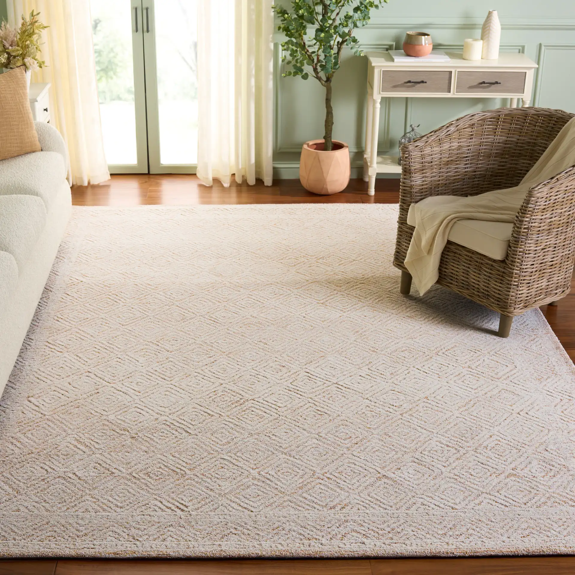 Pine Nested Diamond Hand-Tufted Wool Rug in Ivory / Orange in a styled room