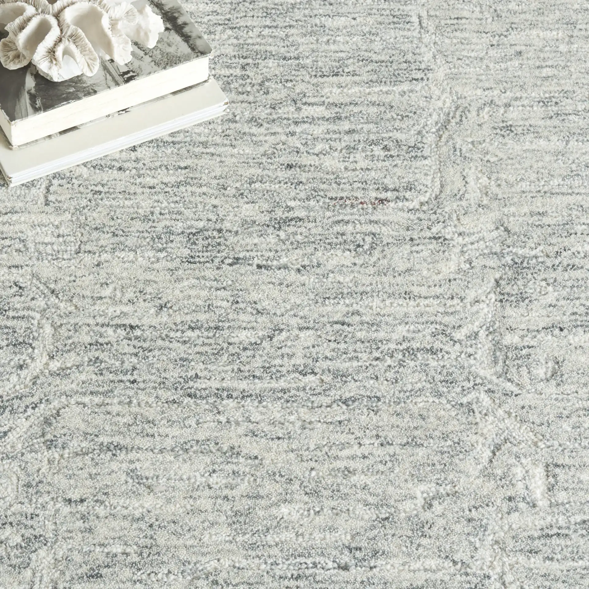 Pine Striated Linear Hand-Tufted Wool Rug in Gray in a styled room