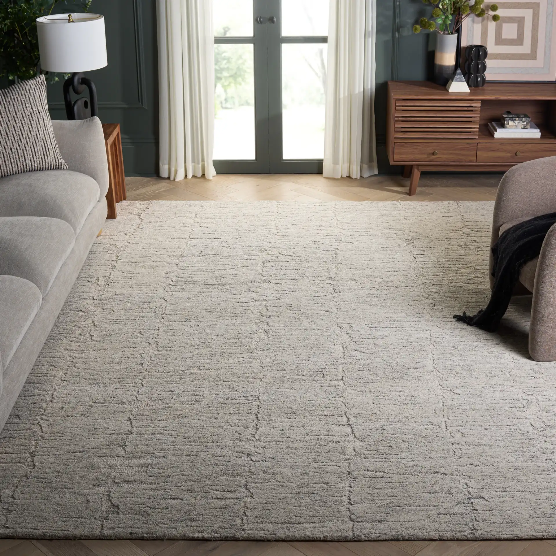 Pine Striated Linear Hand-Tufted Wool Rug in Gray in a styled room