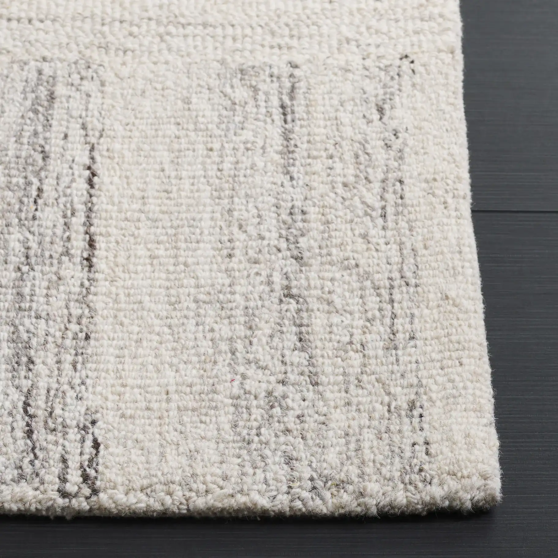 Pine Basketweave Hand-Tufted Wool Rug in Ivory / Gray in a styled room