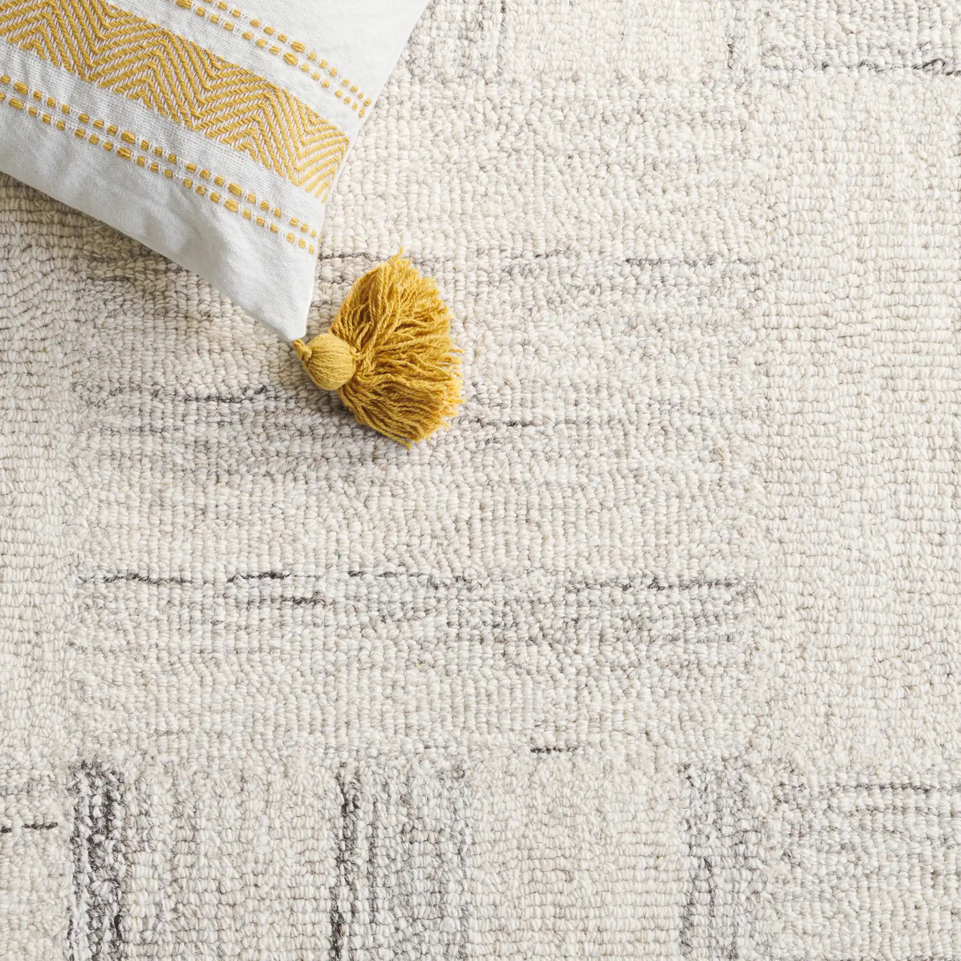 Pine Basketweave Hand-Tufted Wool Rug in Ivory / Gray in a styled room