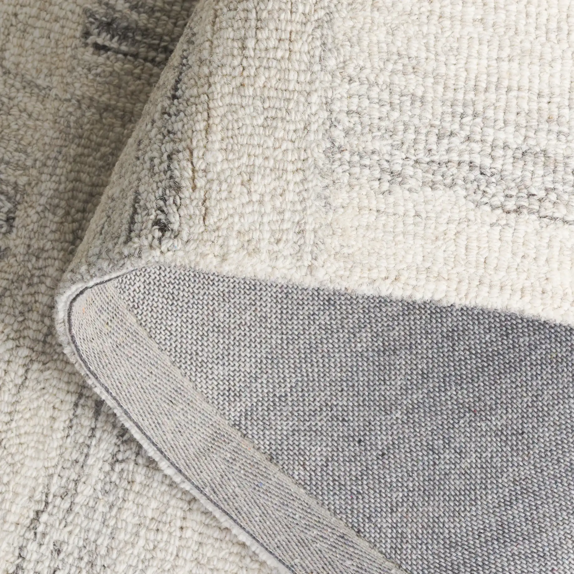 Pine Basketweave Hand-Tufted Wool Rug in Ivory / Gray in a styled room