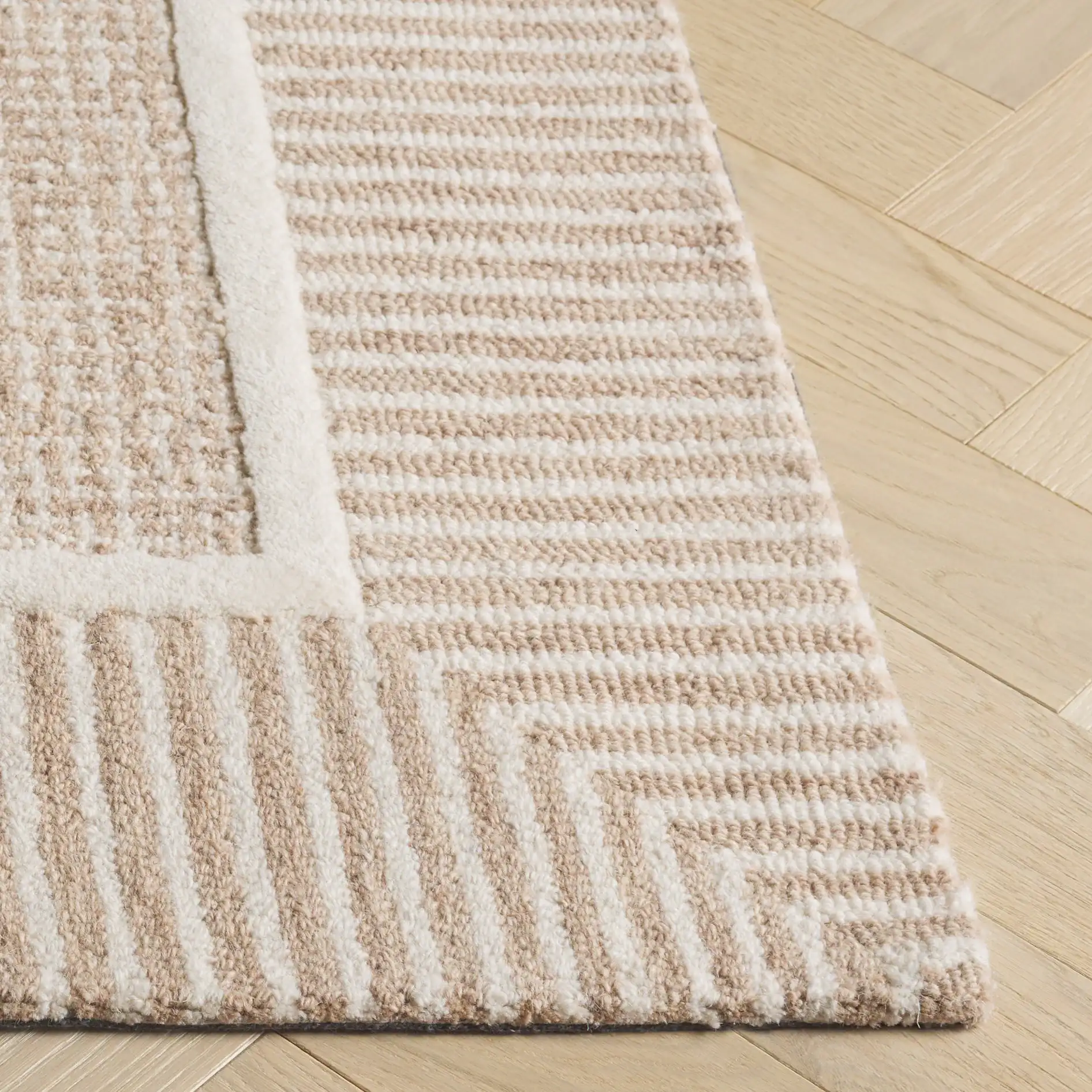 Pine Grid Border Hand-Tufted Wool Rug in Beige / Ivory in a styled room