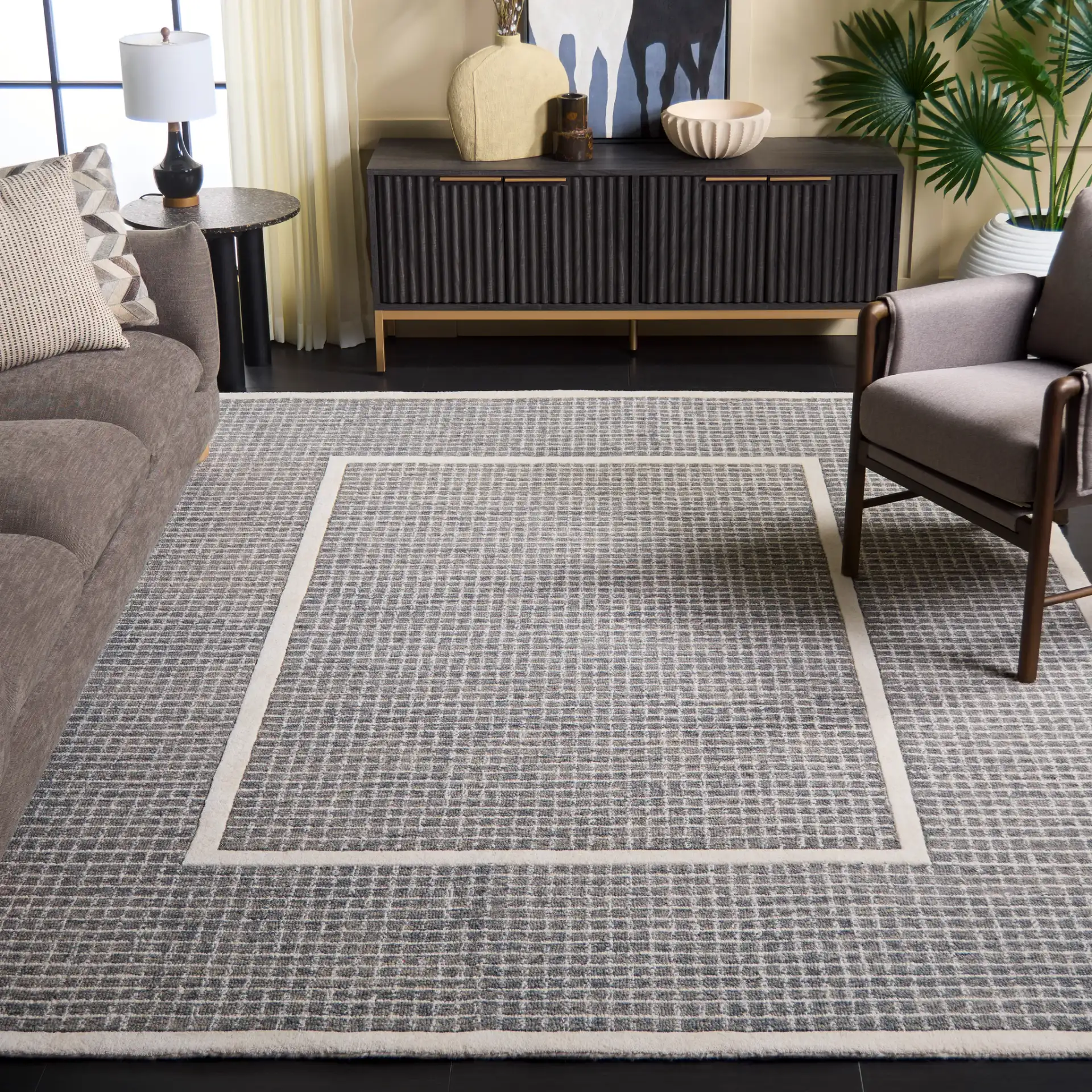 Pine Bordered Grid Hand-Tufted Wool Rug in Gray / Ivory in a styled room