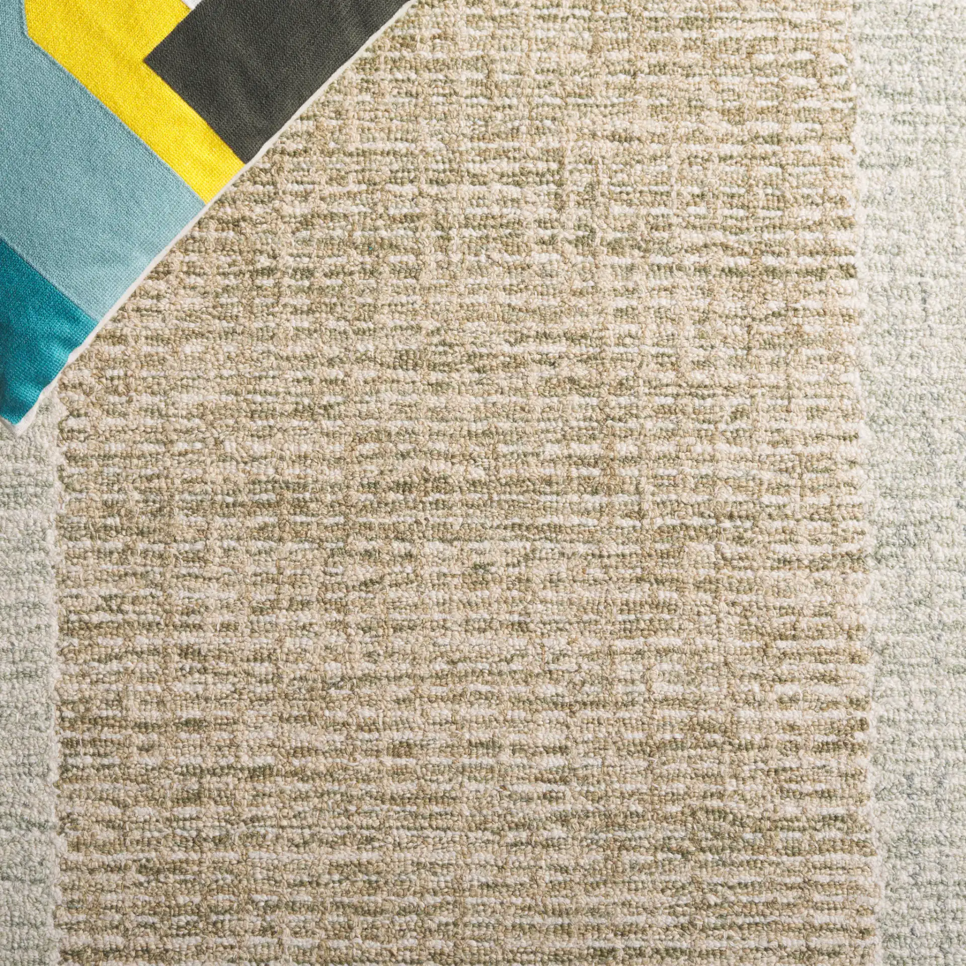 Pine Concentric Border Hand-Tufted Wool Rug in Green / Ivory in a styled room