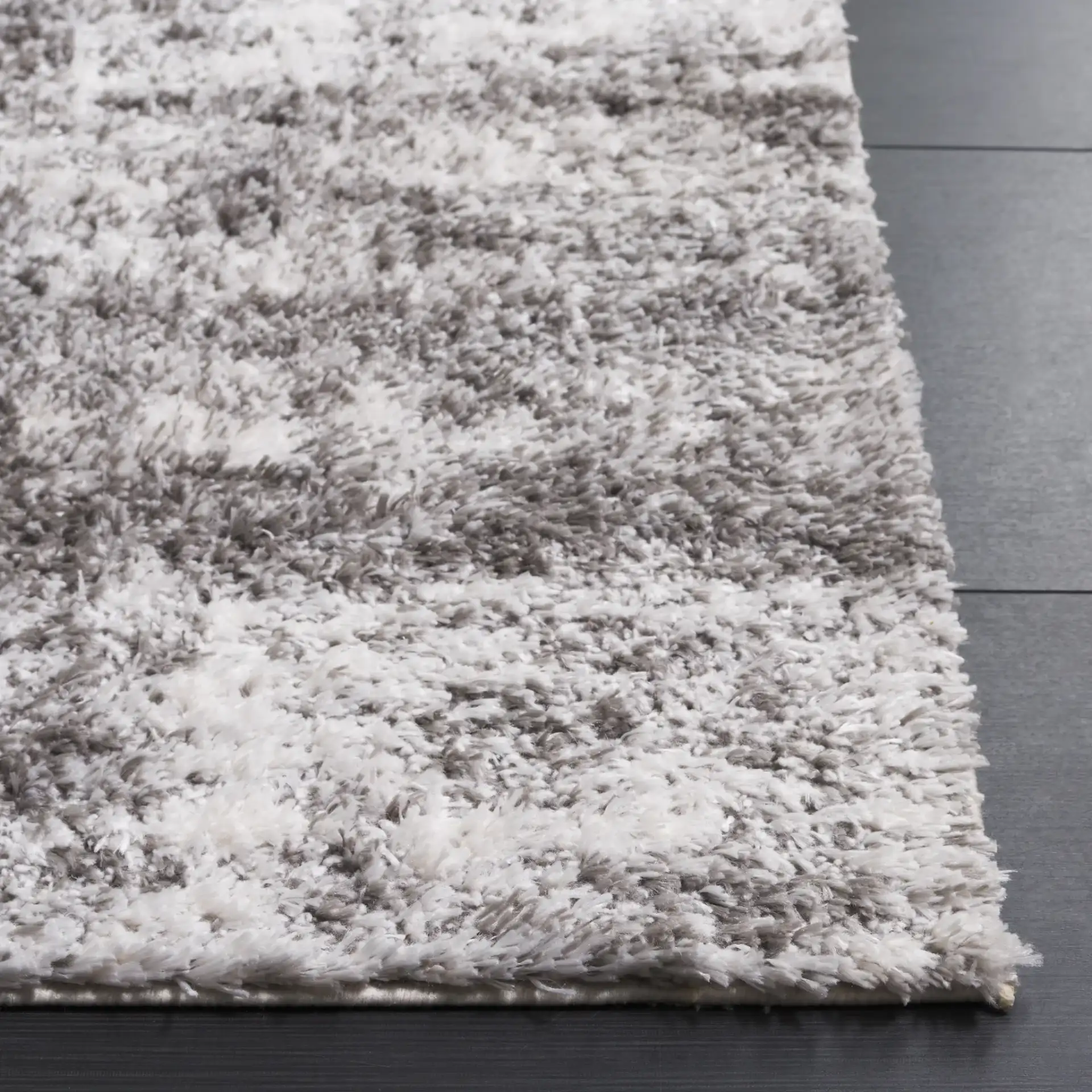Penelope Striated Shag Rug in Gray / Ivory in a styled room