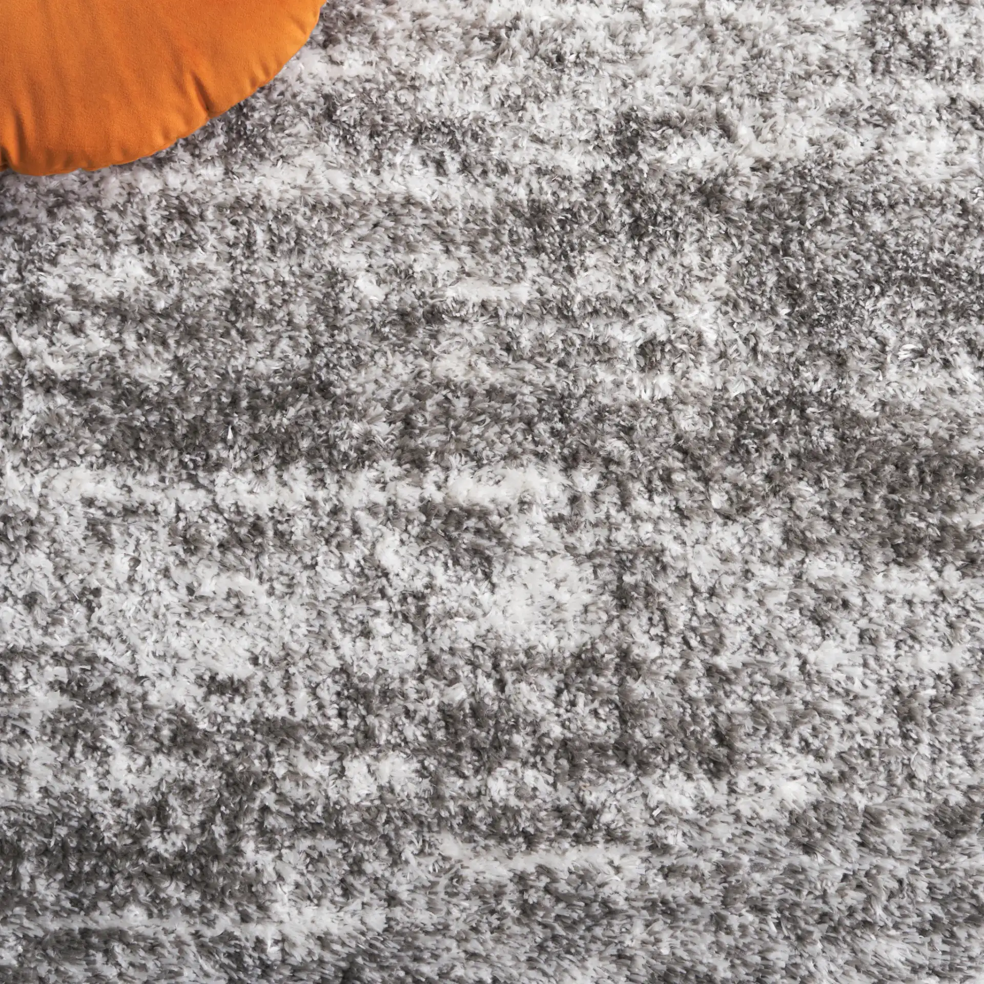 Penelope Striated Shag Rug in Gray / Ivory in a styled room