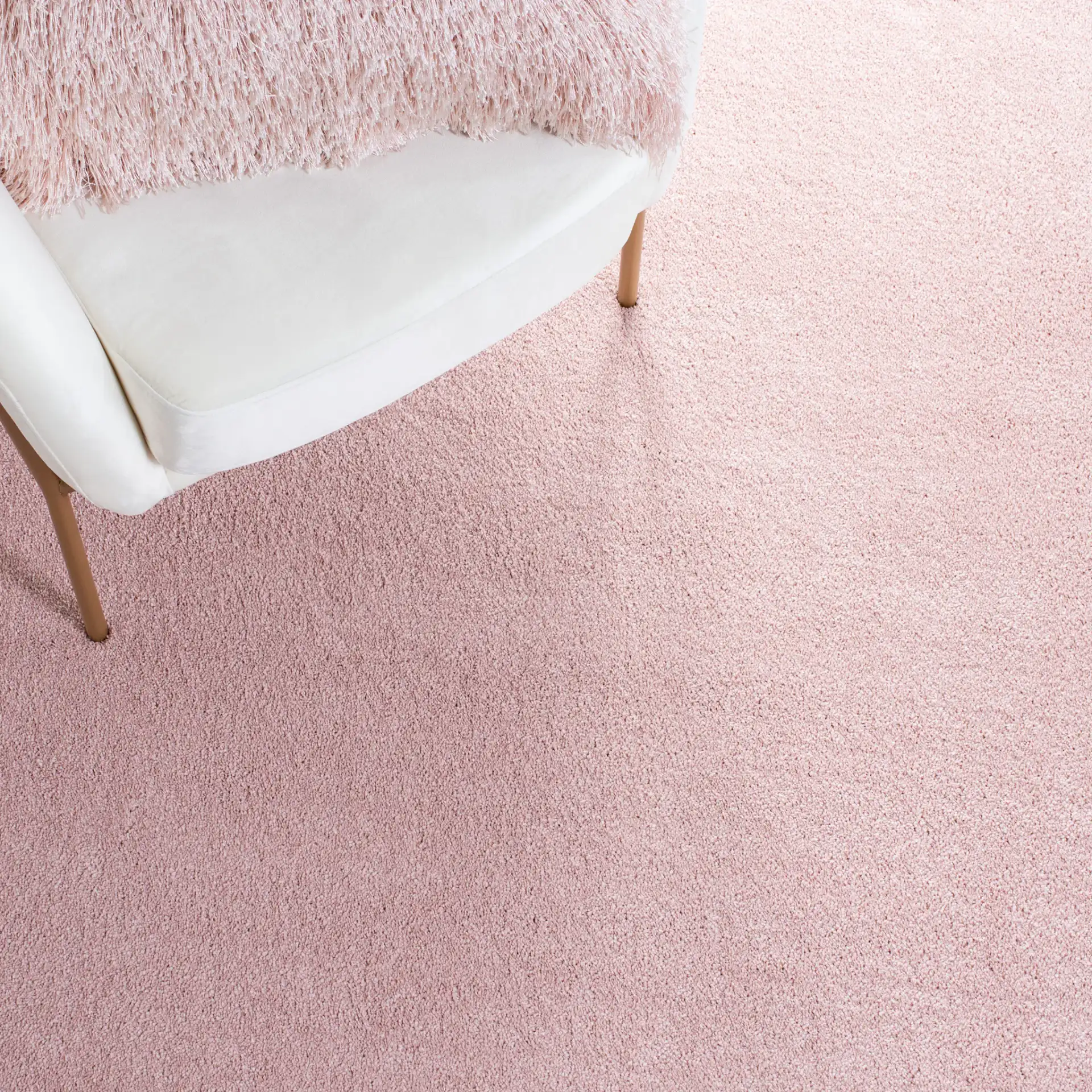 Pattern & Solid Pattern And Solid Textured Solid Rug in Pink in a styled room
