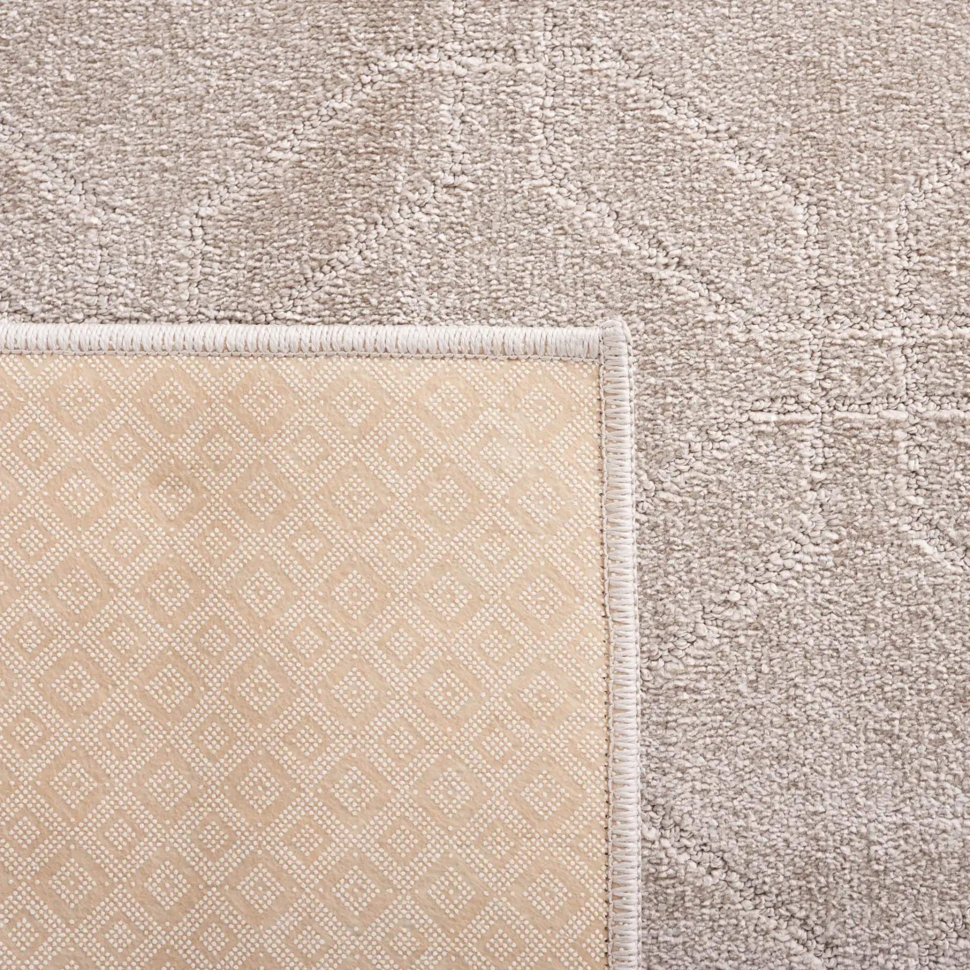 Pattern & Solid Pattern And Solid Interlocking Lattice Rug in Beige in a styled room