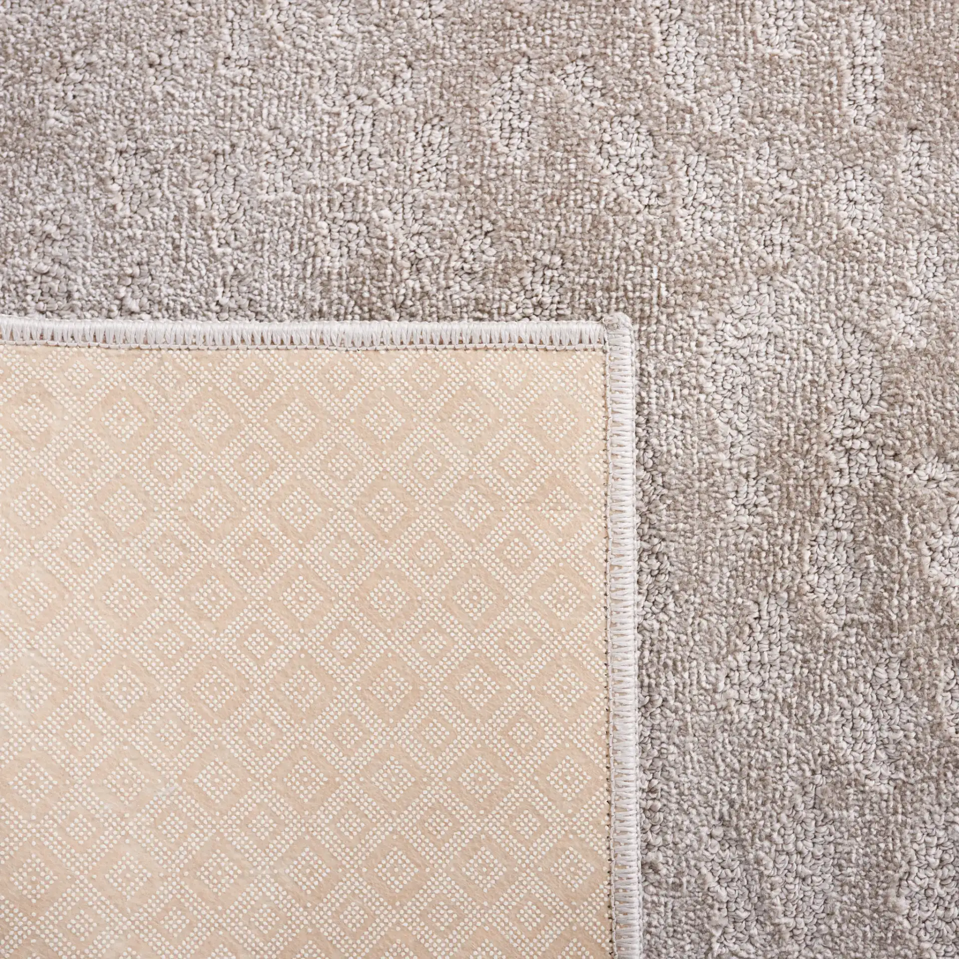 Pattern & Solid Pattern And Solid Spotted Rug in Beige in a styled room