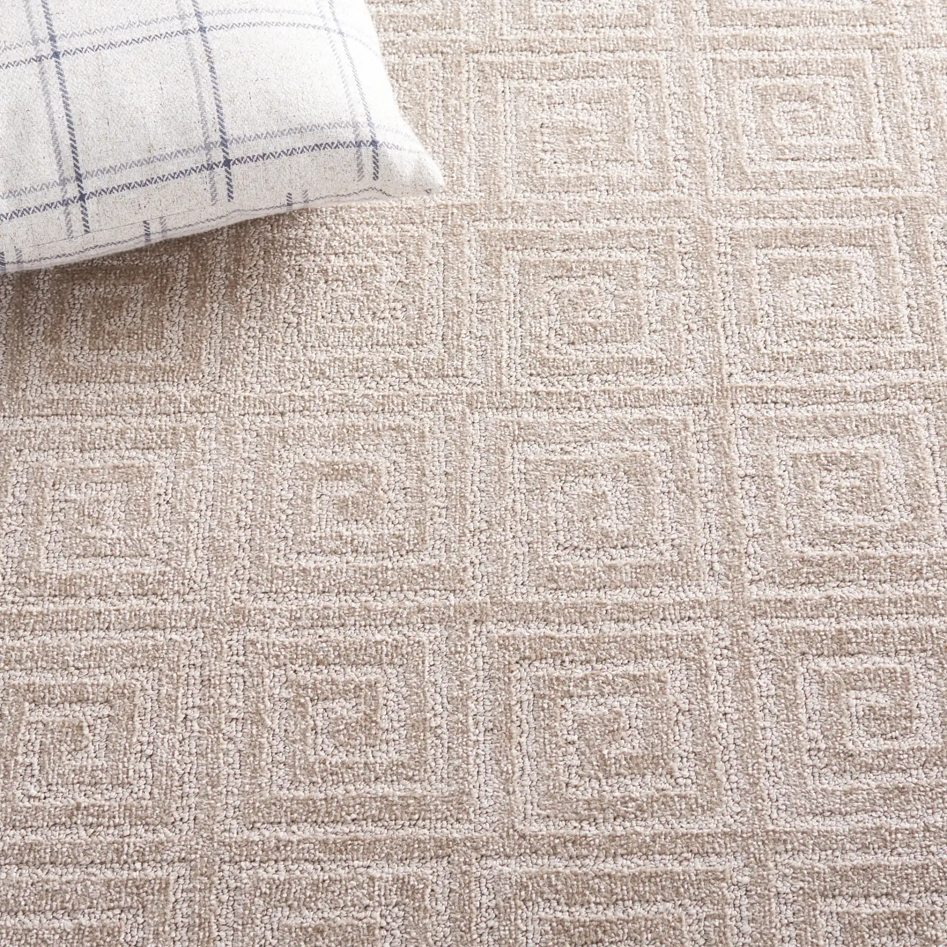 Pattern & Solid Pattern And Solid Greek Key Grid Rug in Beige in a styled room