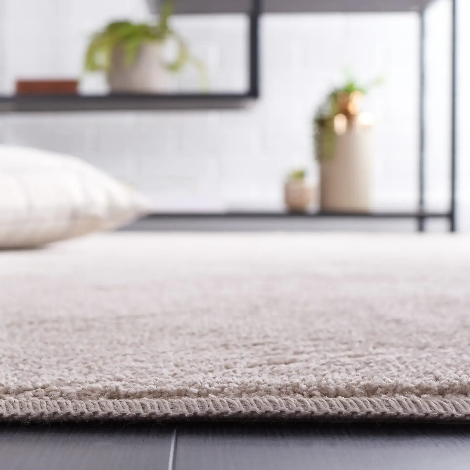 Pattern & Solid Pattern And Solid Diamond Grid Rug in Beige in a styled room