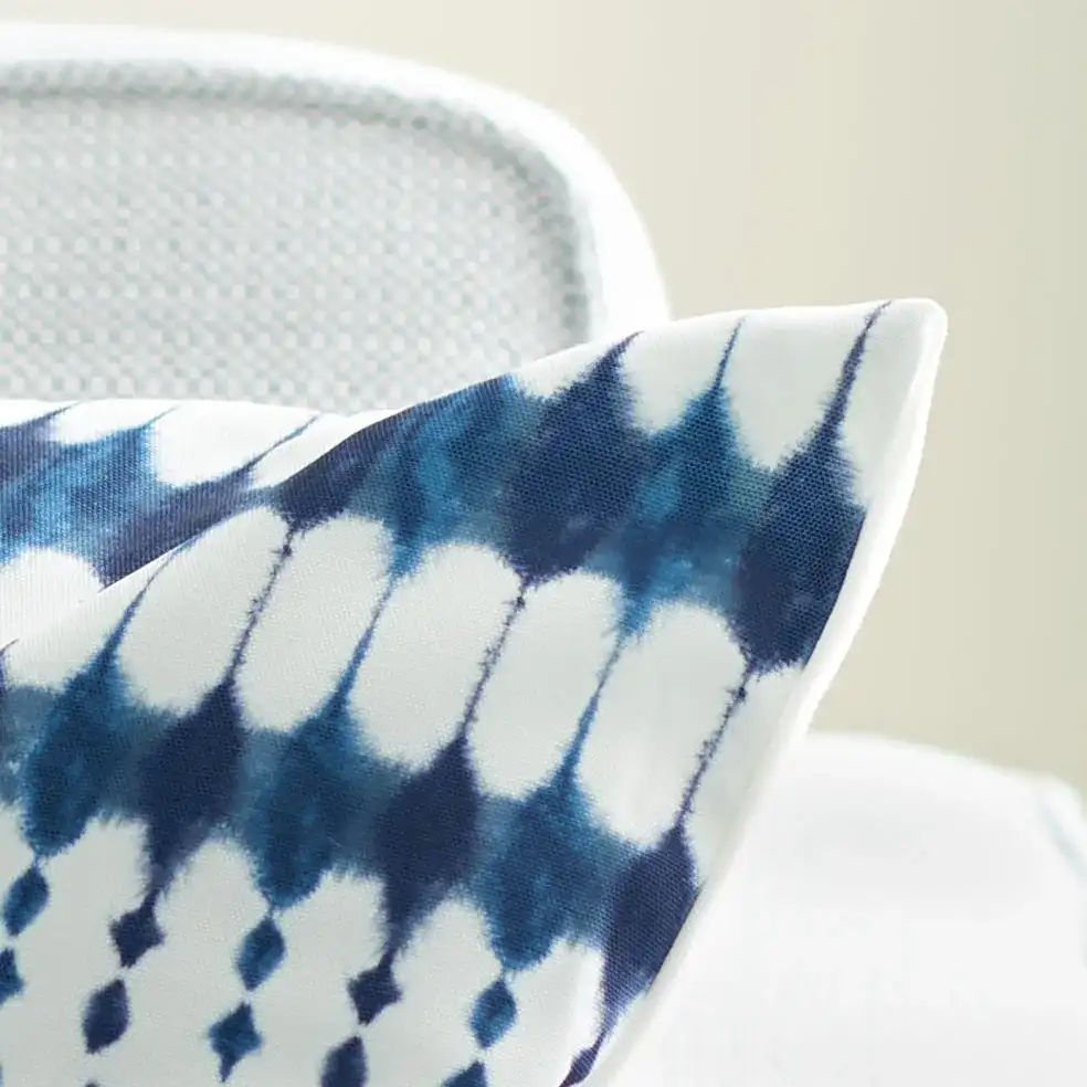 Indoor/Outdoor Kenza Pillow in Navy / White in a styled room