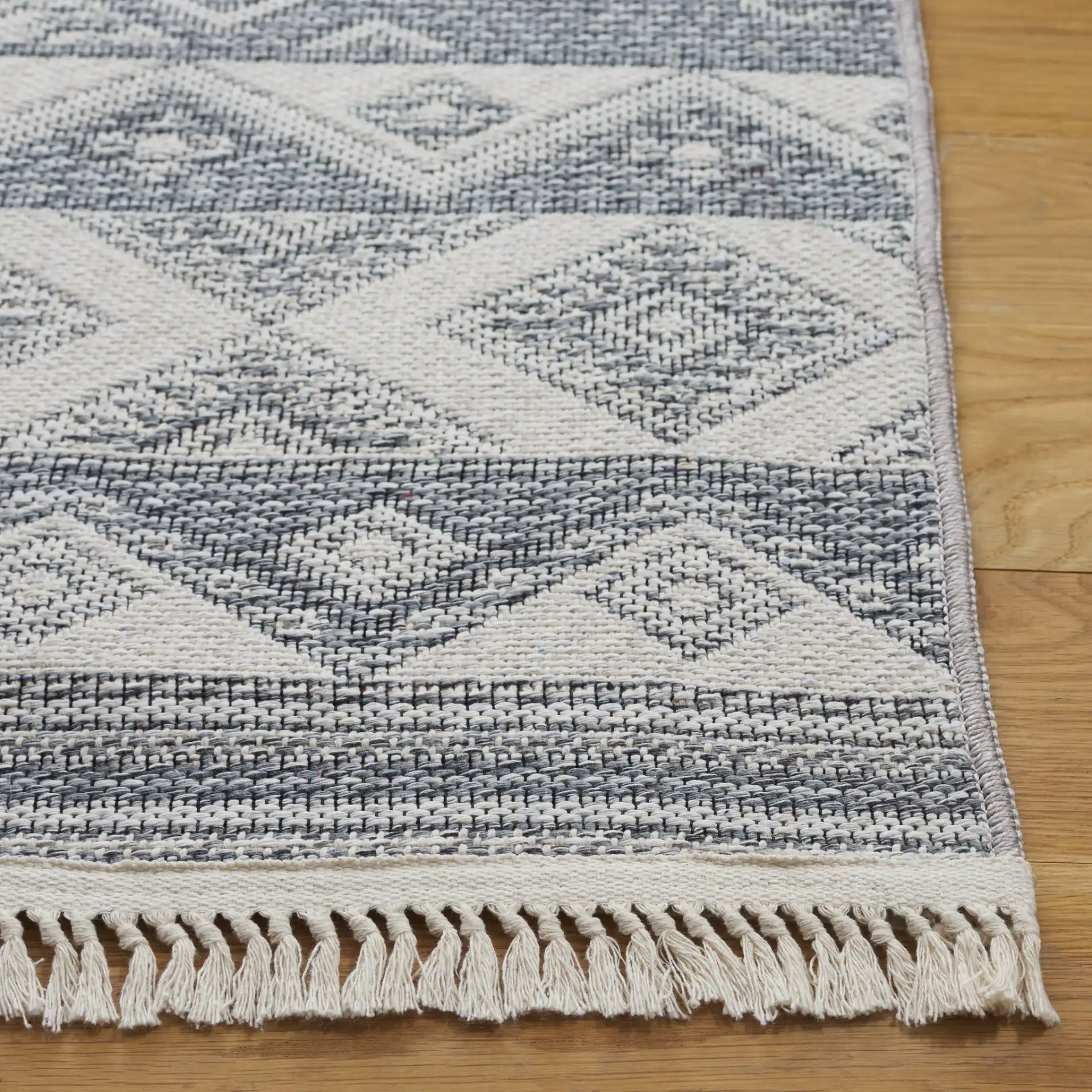 Prairie Banded Diamond Rug in Blue / Gray in a styled room