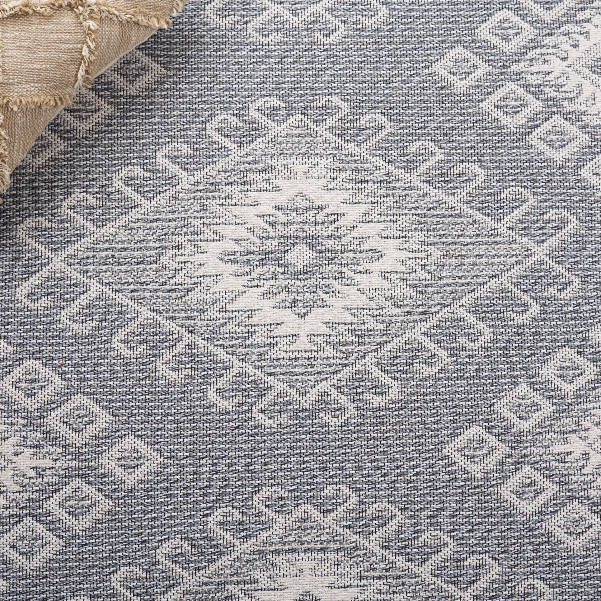 Prairie Banded Diamond Rug in Blue / Gray in a styled room