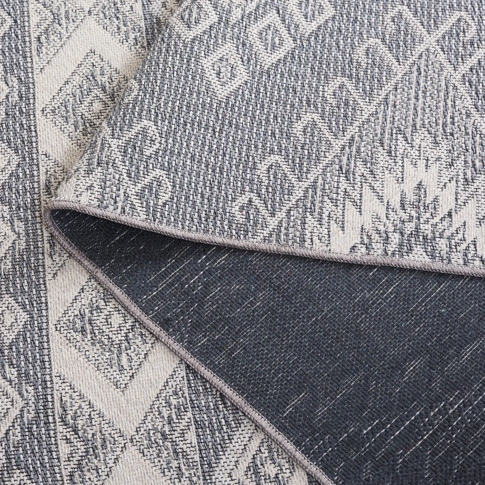 Prairie Banded Diamond Rug in Blue / Gray in a styled room