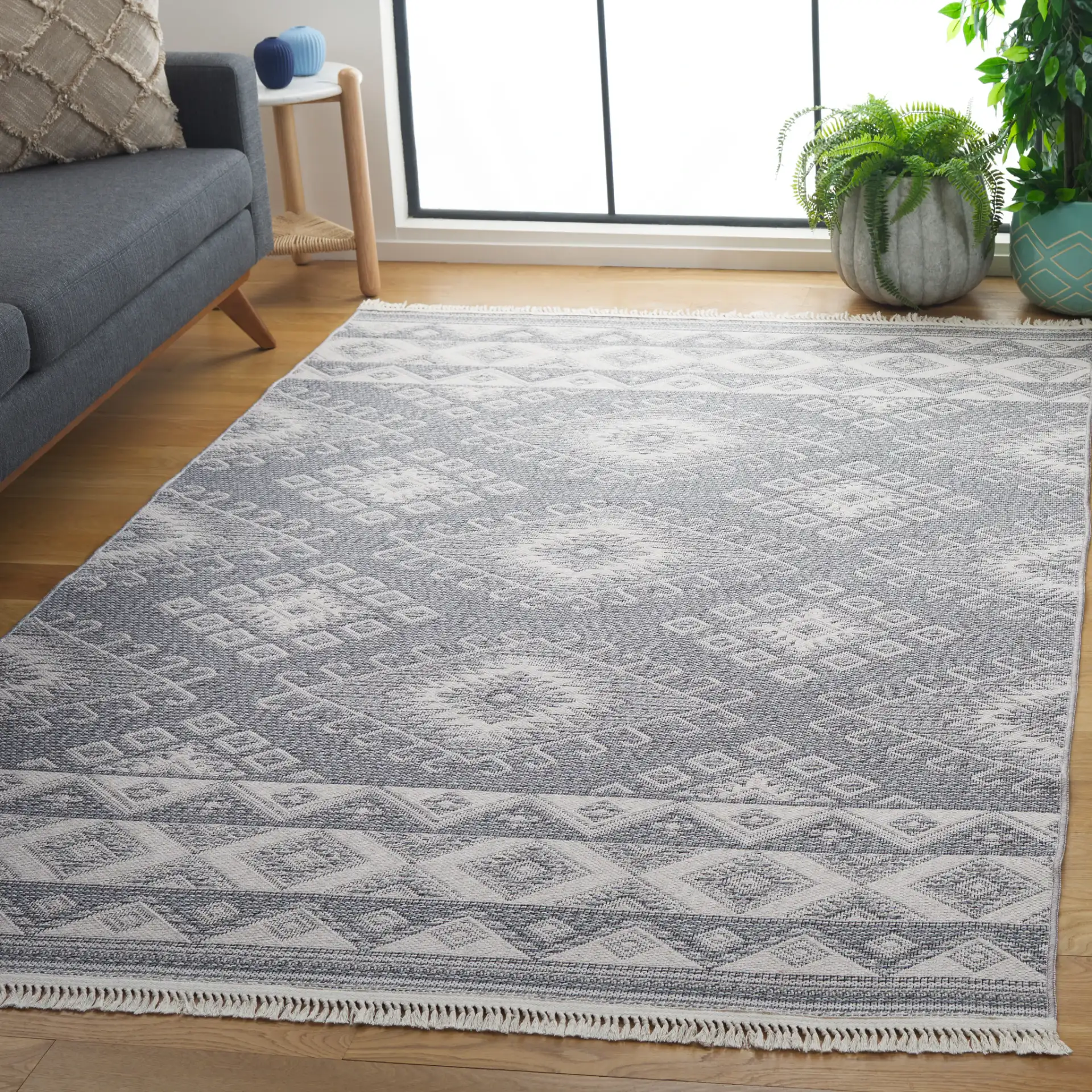 Prairie Banded Diamond Rug in Blue / Gray in a styled room