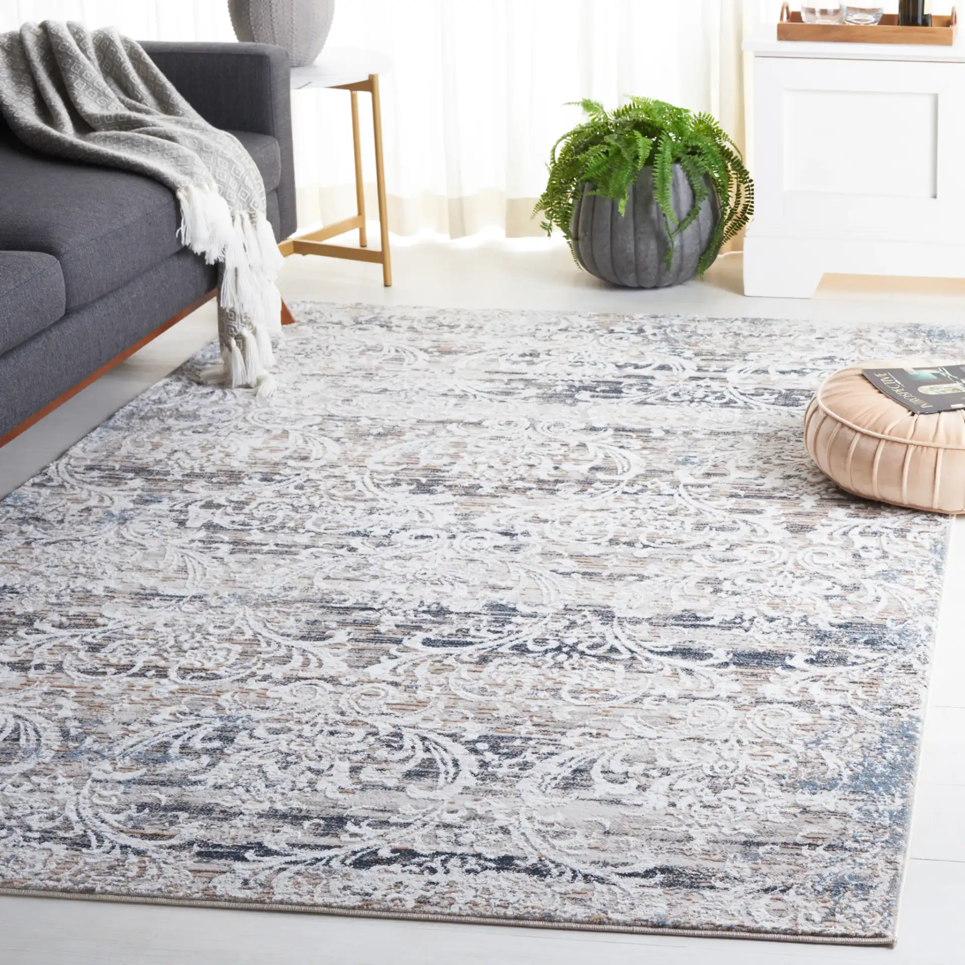 Parker Transitional Vintaged Damask Rug in Taupe / Ivory Gray in a styled room