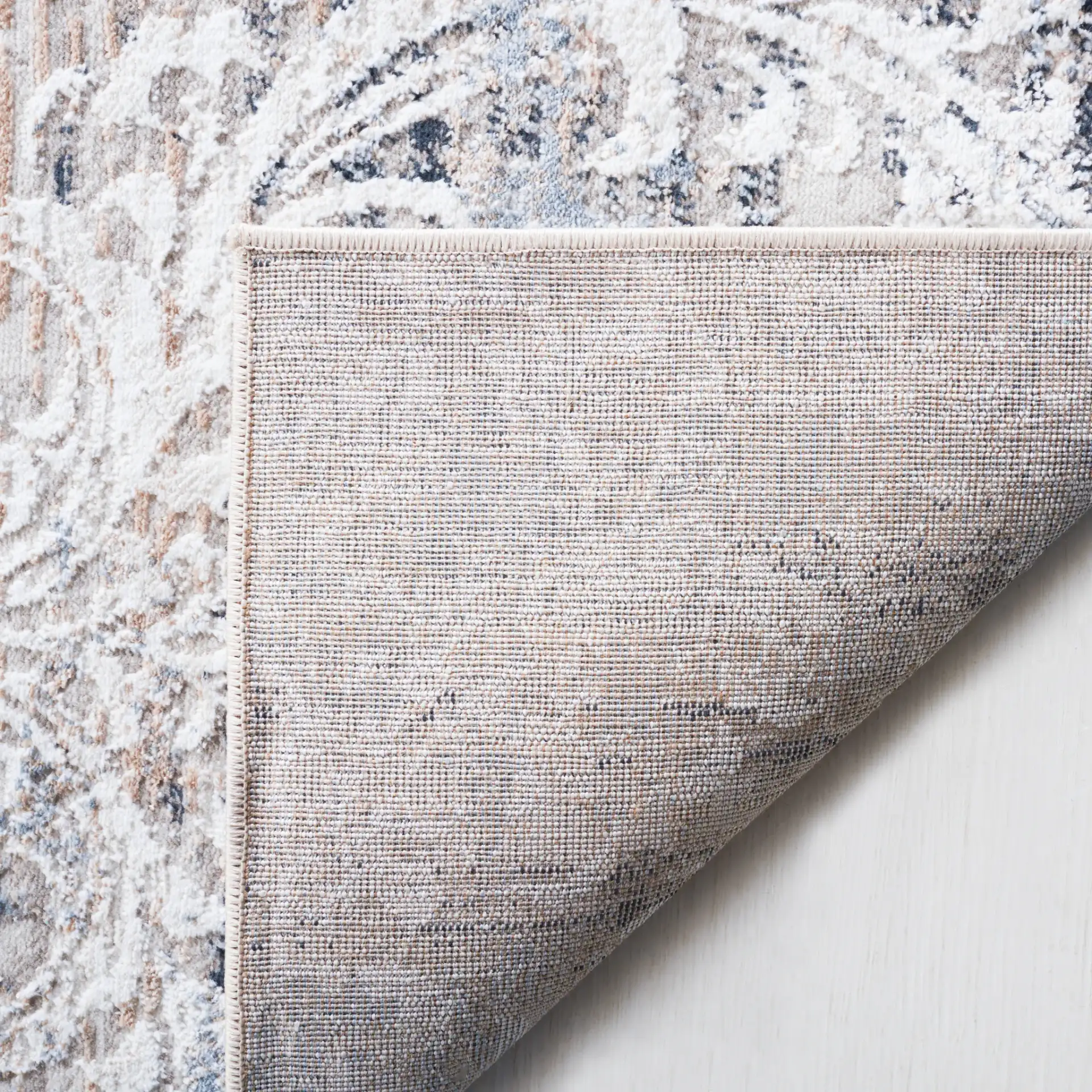 Parker Transitional Vintaged Damask Rug in Taupe / Ivory Gray in a styled room