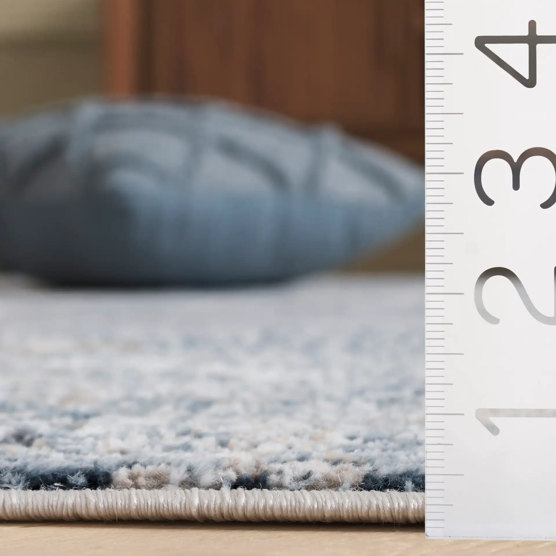 Parker Distressed Panel Rug in Blue / Taupe in a styled room