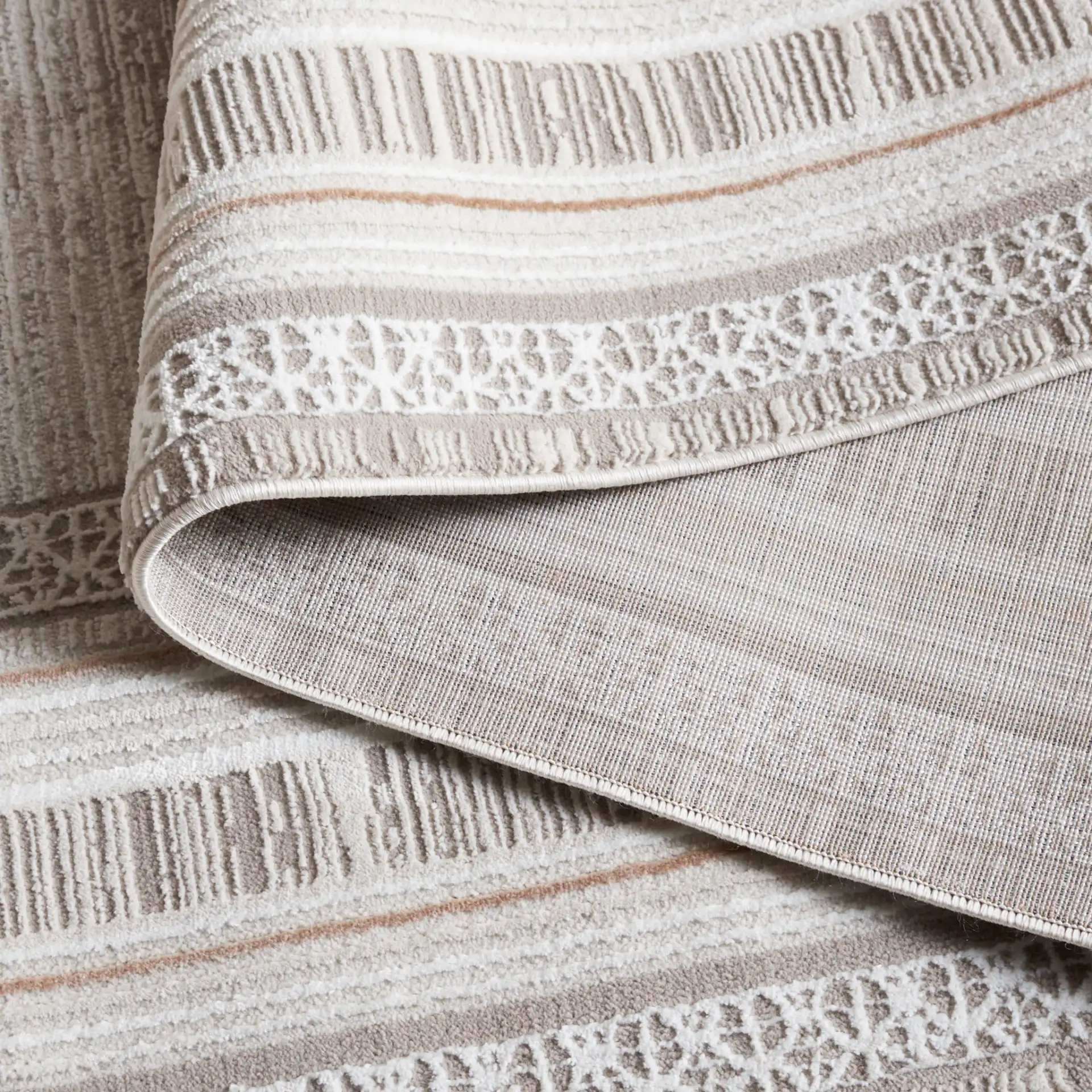 Parker Multi-Border Rug in Taupe / Gray Gold in a styled room