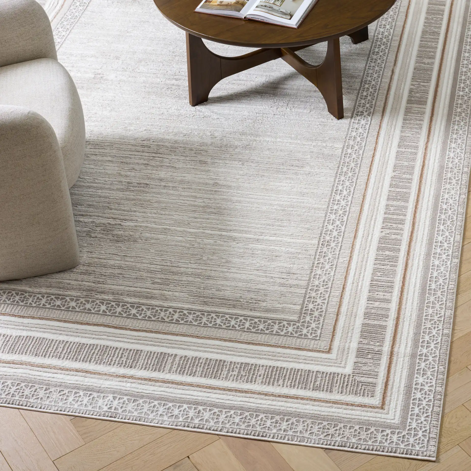 Parker Multi-Border Rug in Taupe / Gray Gold in a styled room