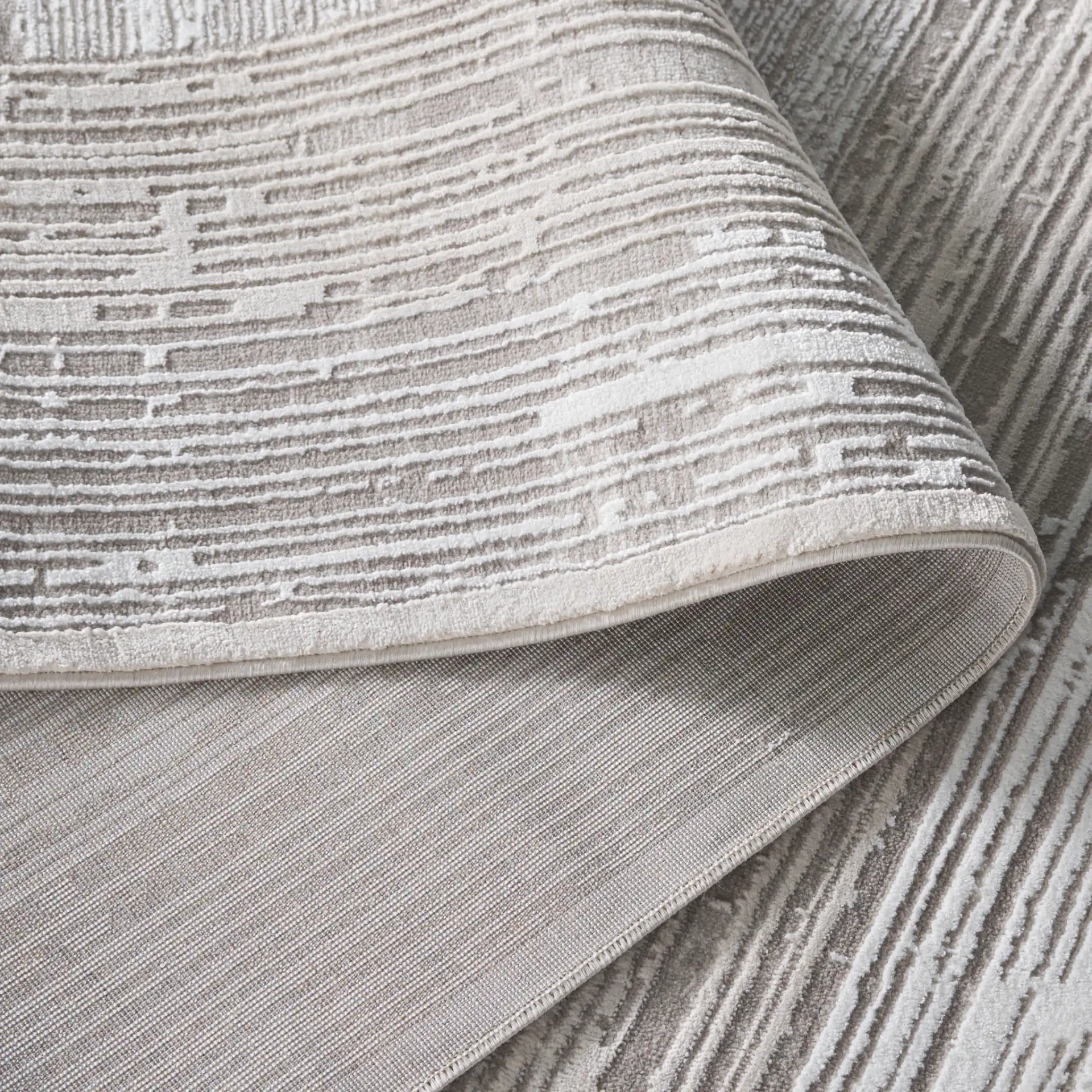 Parker Concentric Border Rug in Taupe / Gray Ivory in a styled room