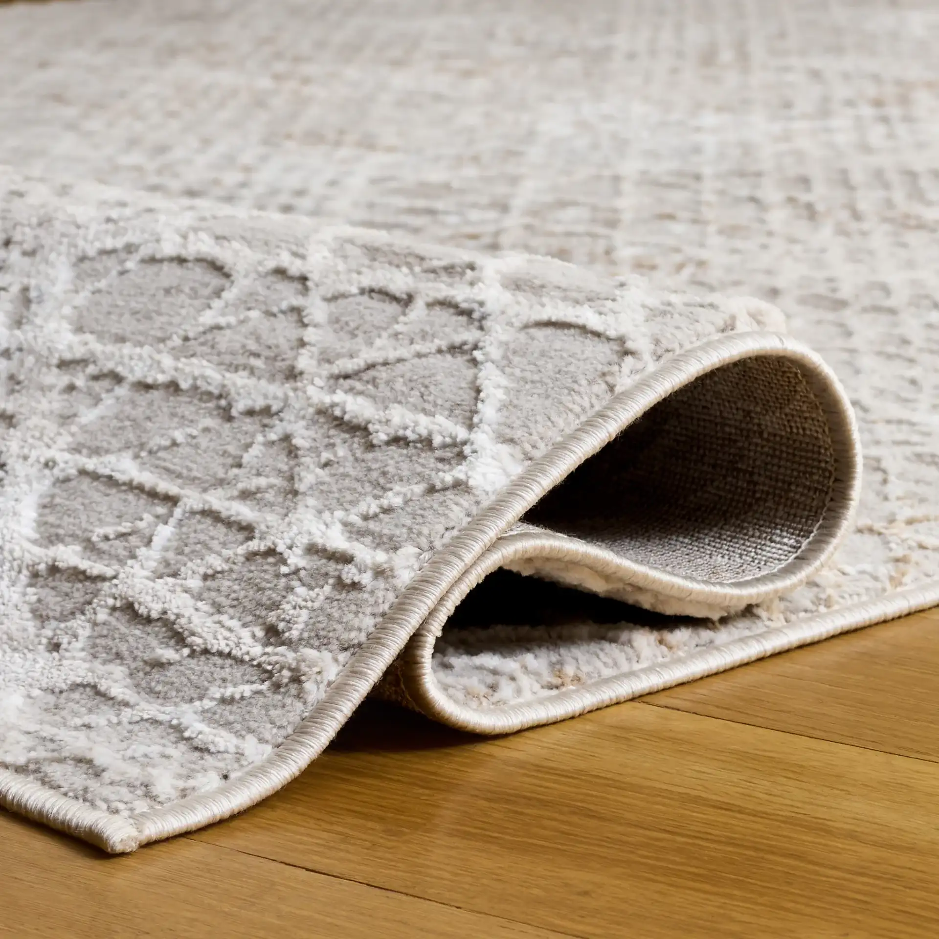 Parker Distressed Diamond Trellis Rug in Taupe / Gray Ivory in a styled room