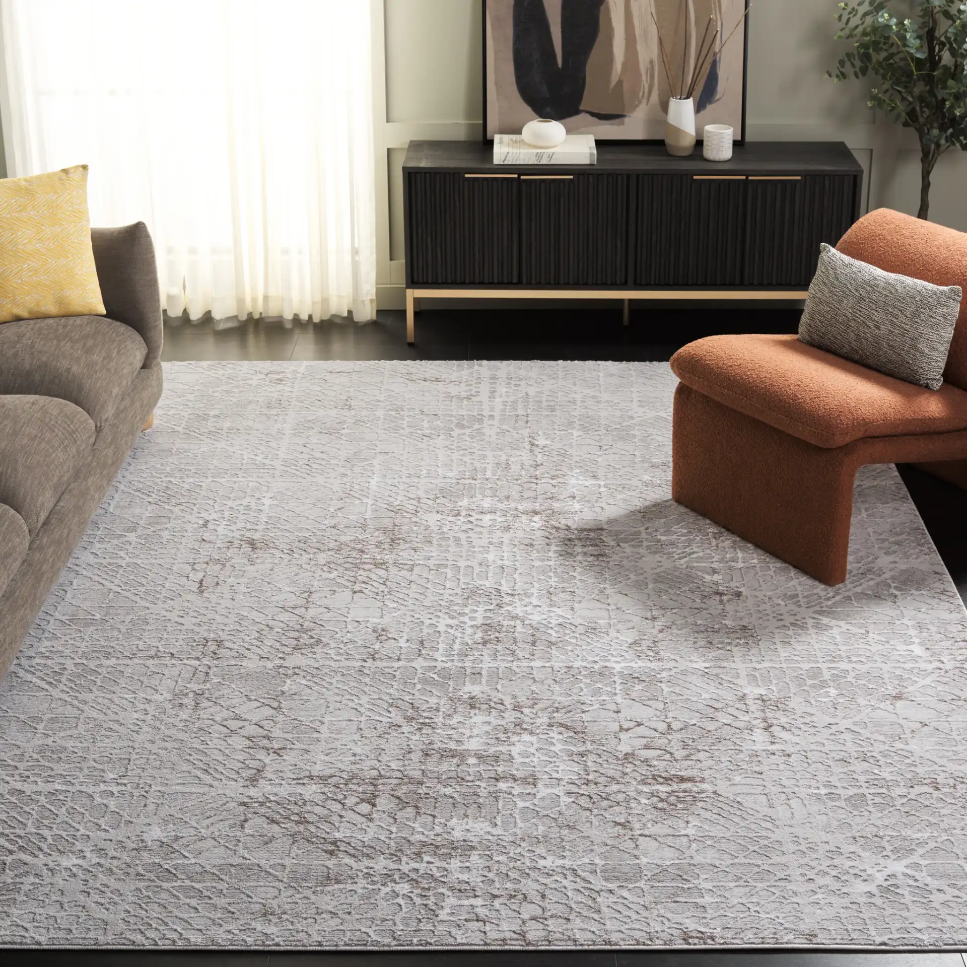 Parker Distressed Diamond Trellis Rug in Taupe / Gray Ivory in a styled room