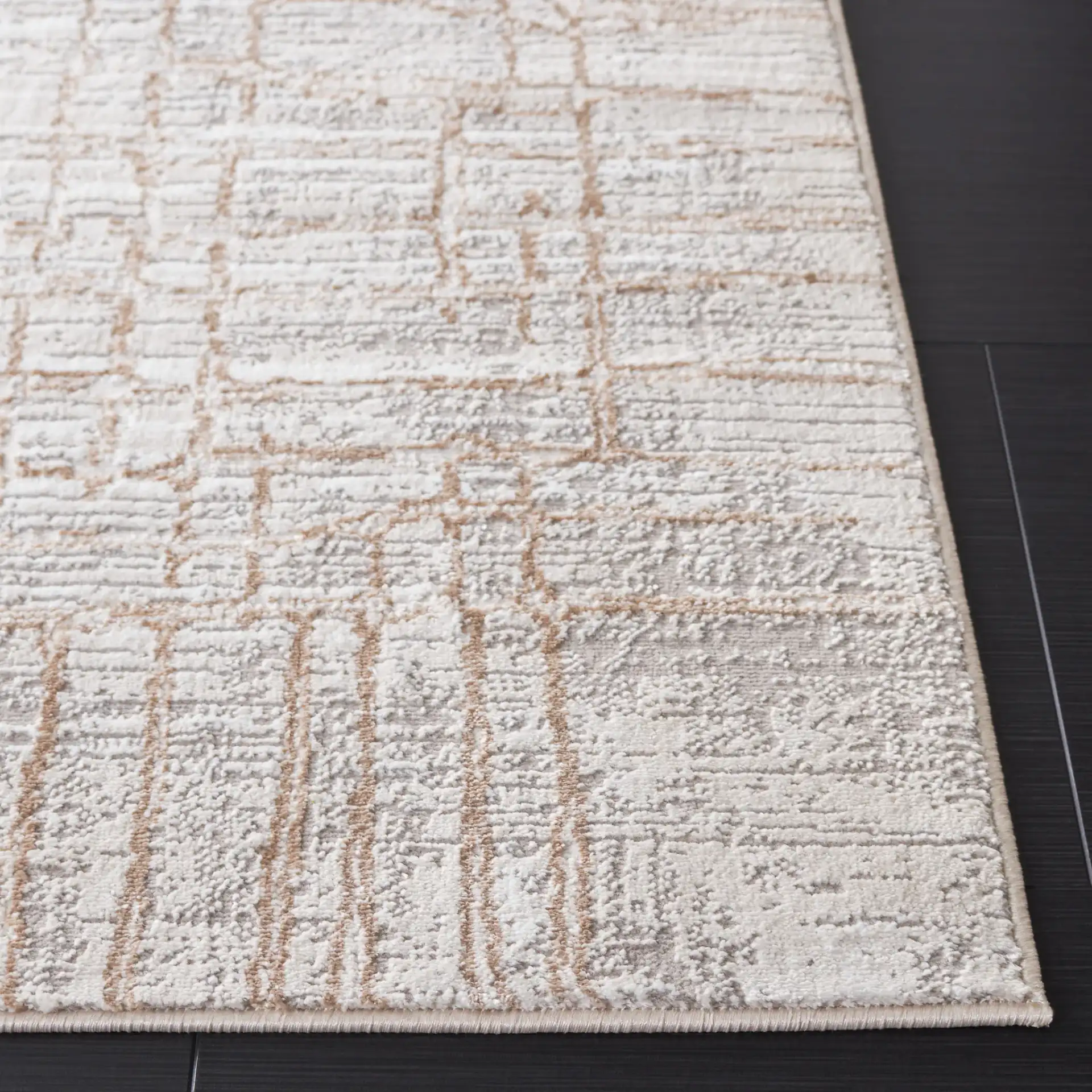 Parker Grid Border Rug in Taupe / Beige Gold in a styled room