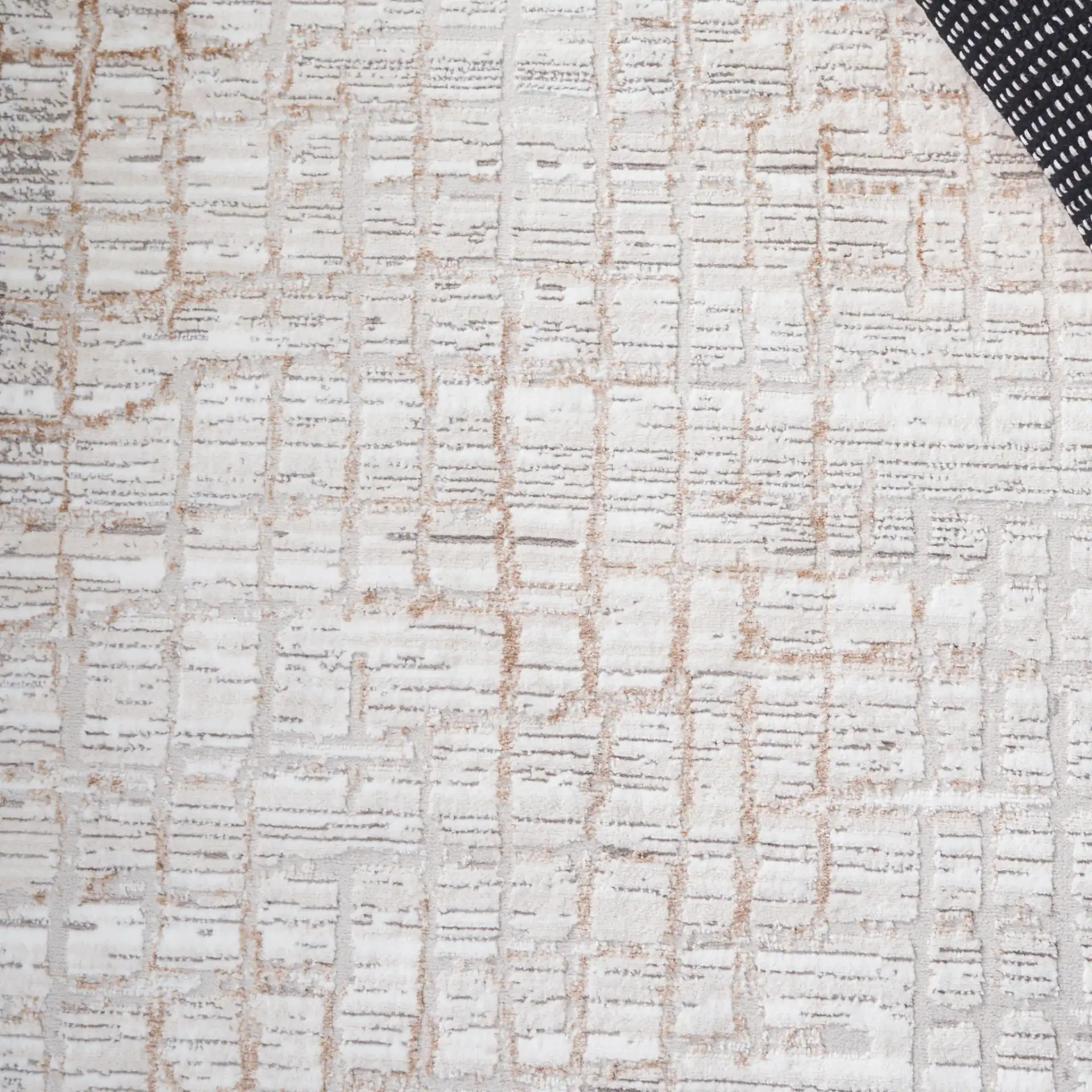 Parker Grid Border Rug in Taupe / Beige Gold in a styled room
