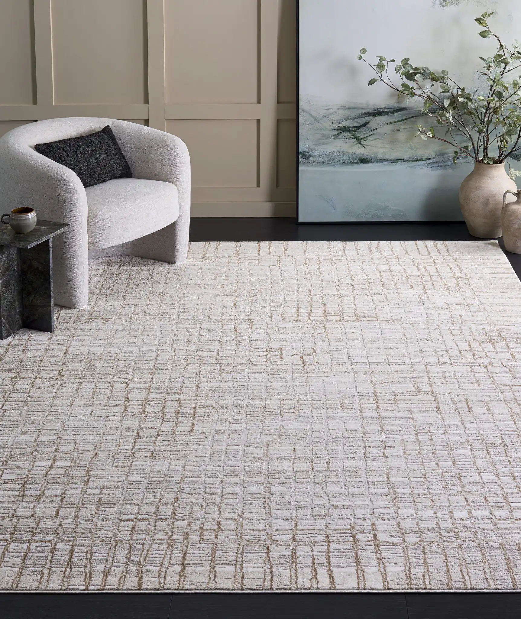 Parker Grid Border Rug in Taupe / Beige Gold in a styled room
