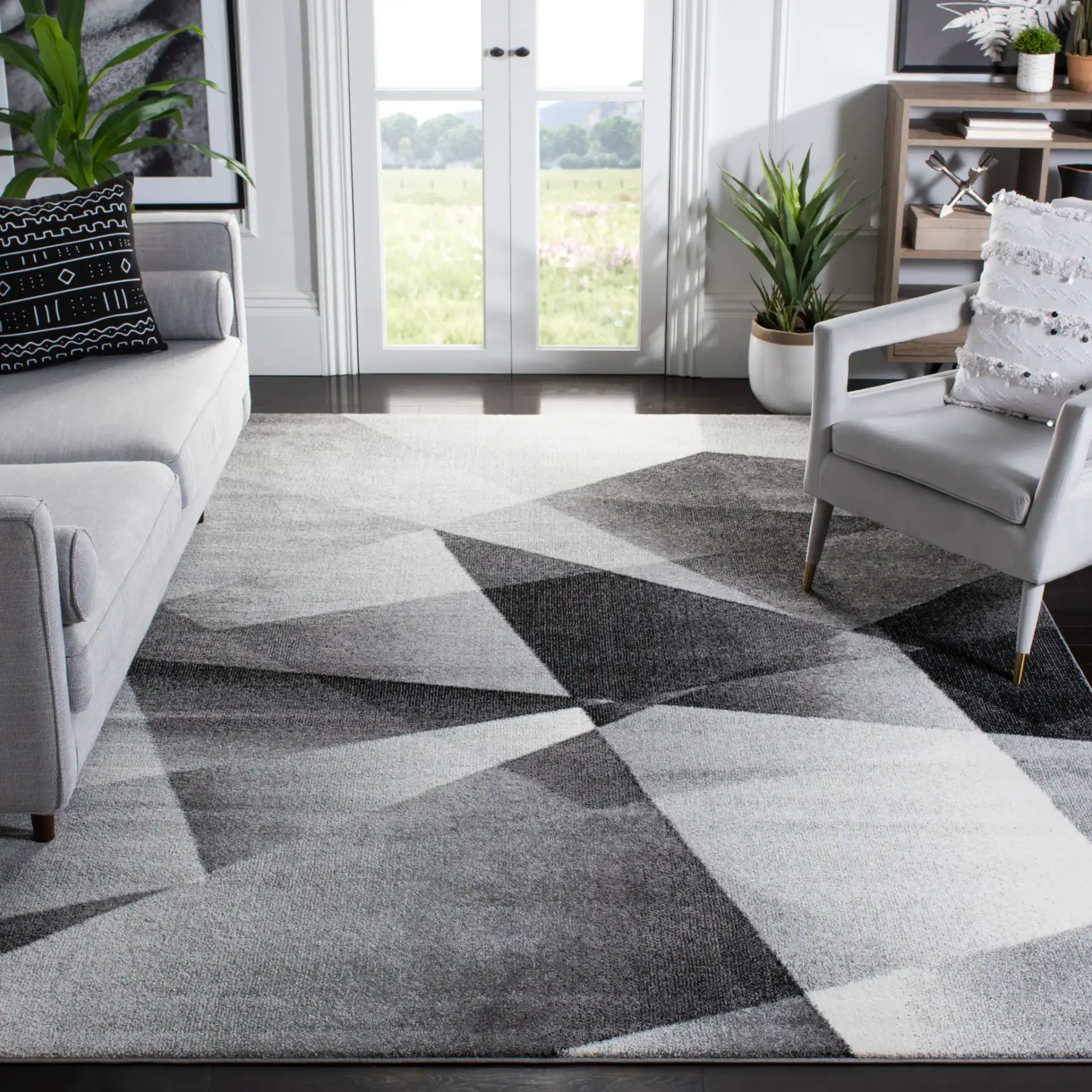 Porcello Faceted Geometric Rug in Light Gray / Charcoal in a styled room