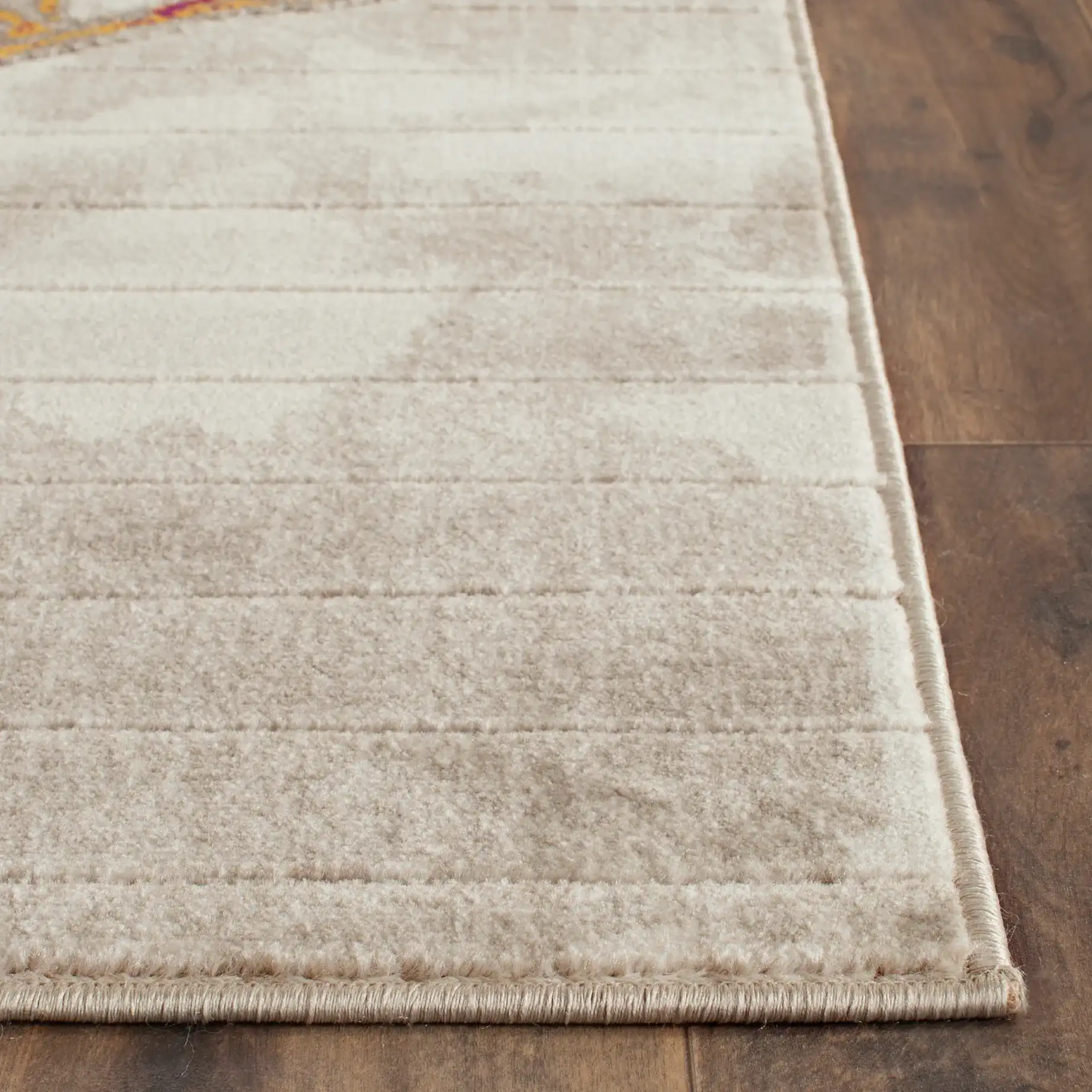 Porcello Oversized Bloom Rug in Ivory / Gray in a styled room