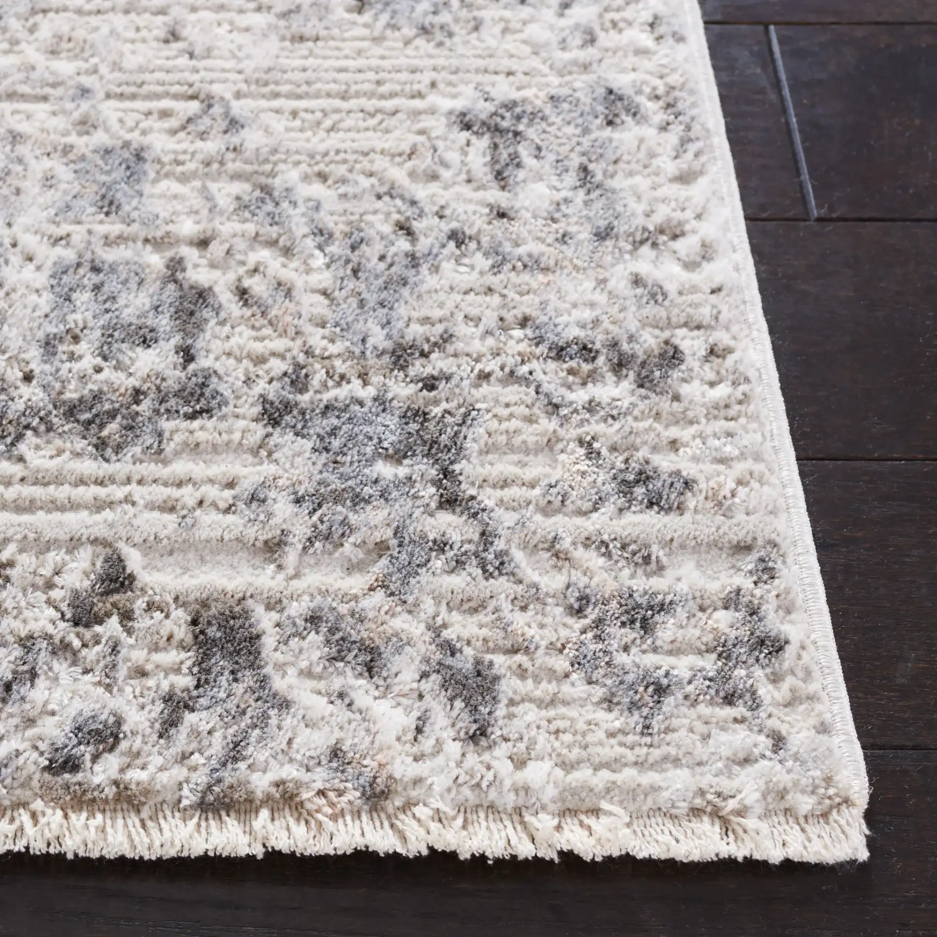 Princeton Distressed Abstract Rug in Ivory / Gray in a styled room