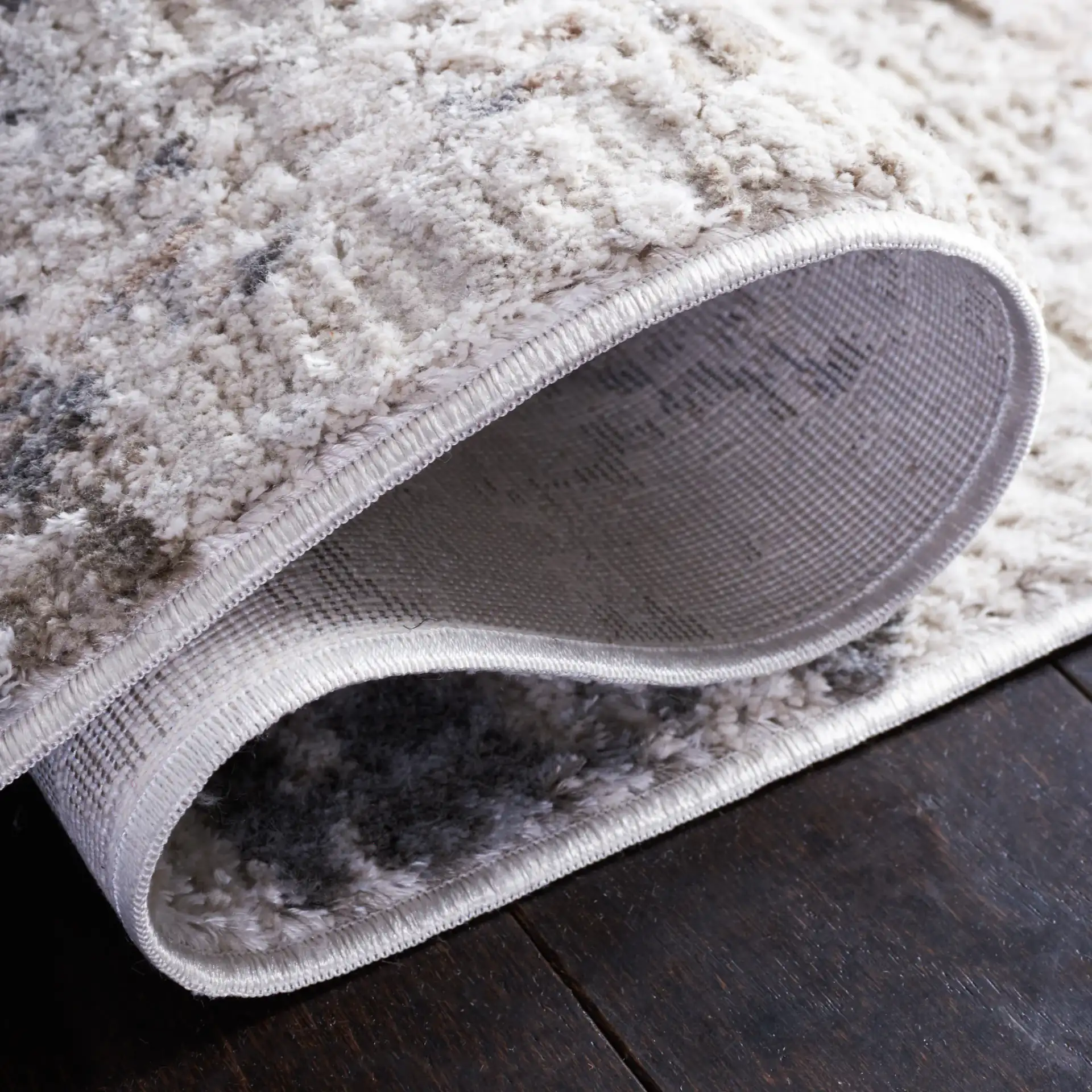 Princeton Distressed Abstract Rug in Ivory / Gray in a styled room