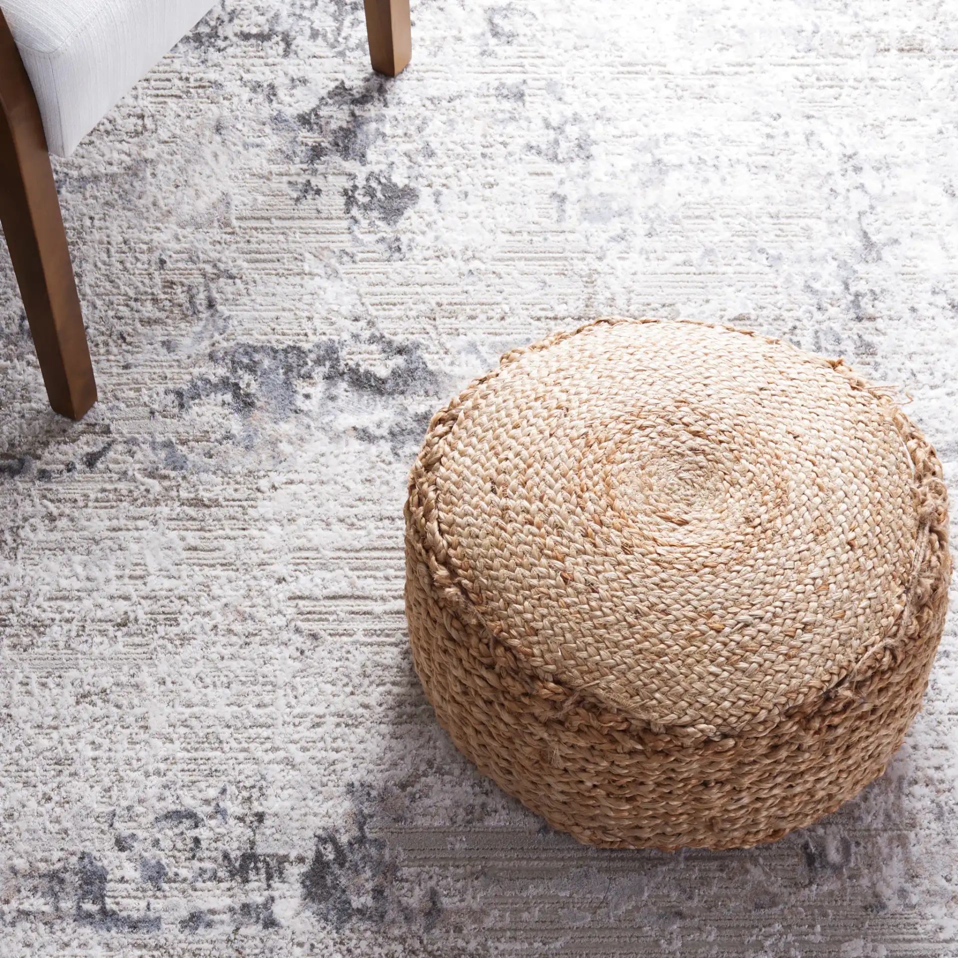 Princeton Distressed Abstract Rug in Ivory / Gray in a styled room