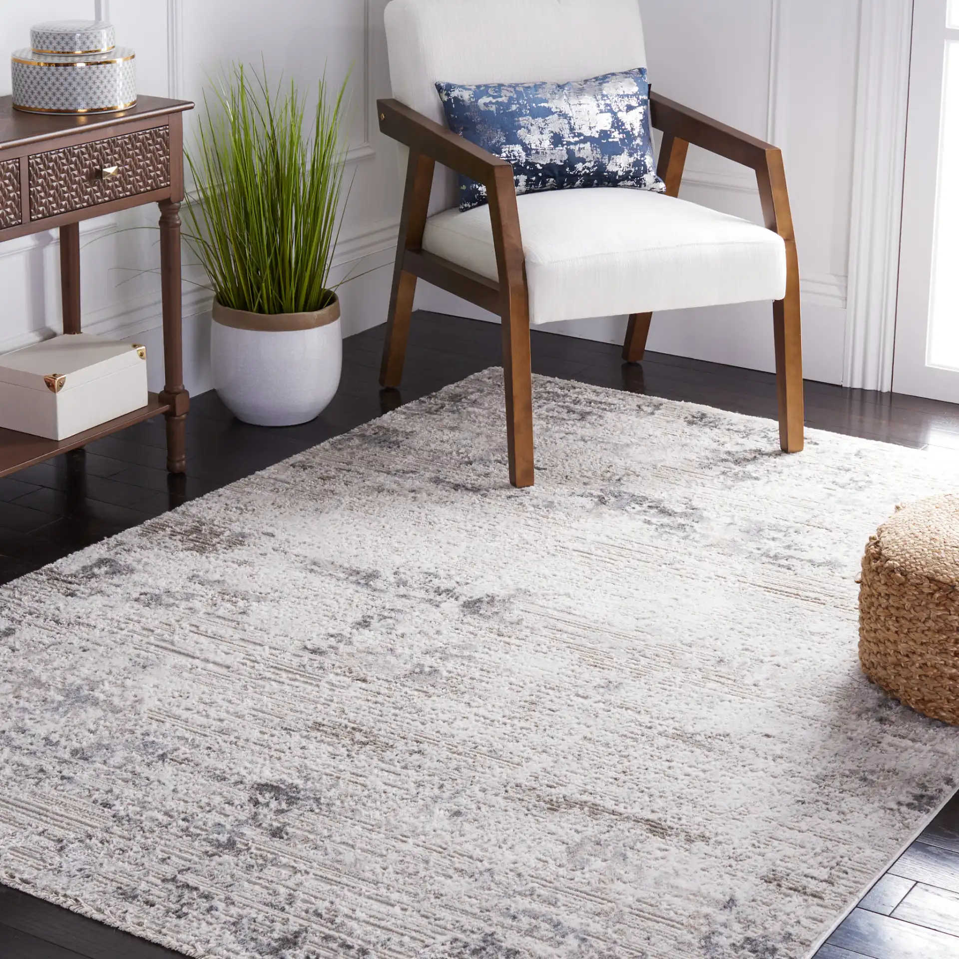 Princeton Distressed Abstract Rug in Ivory / Gray in a styled room