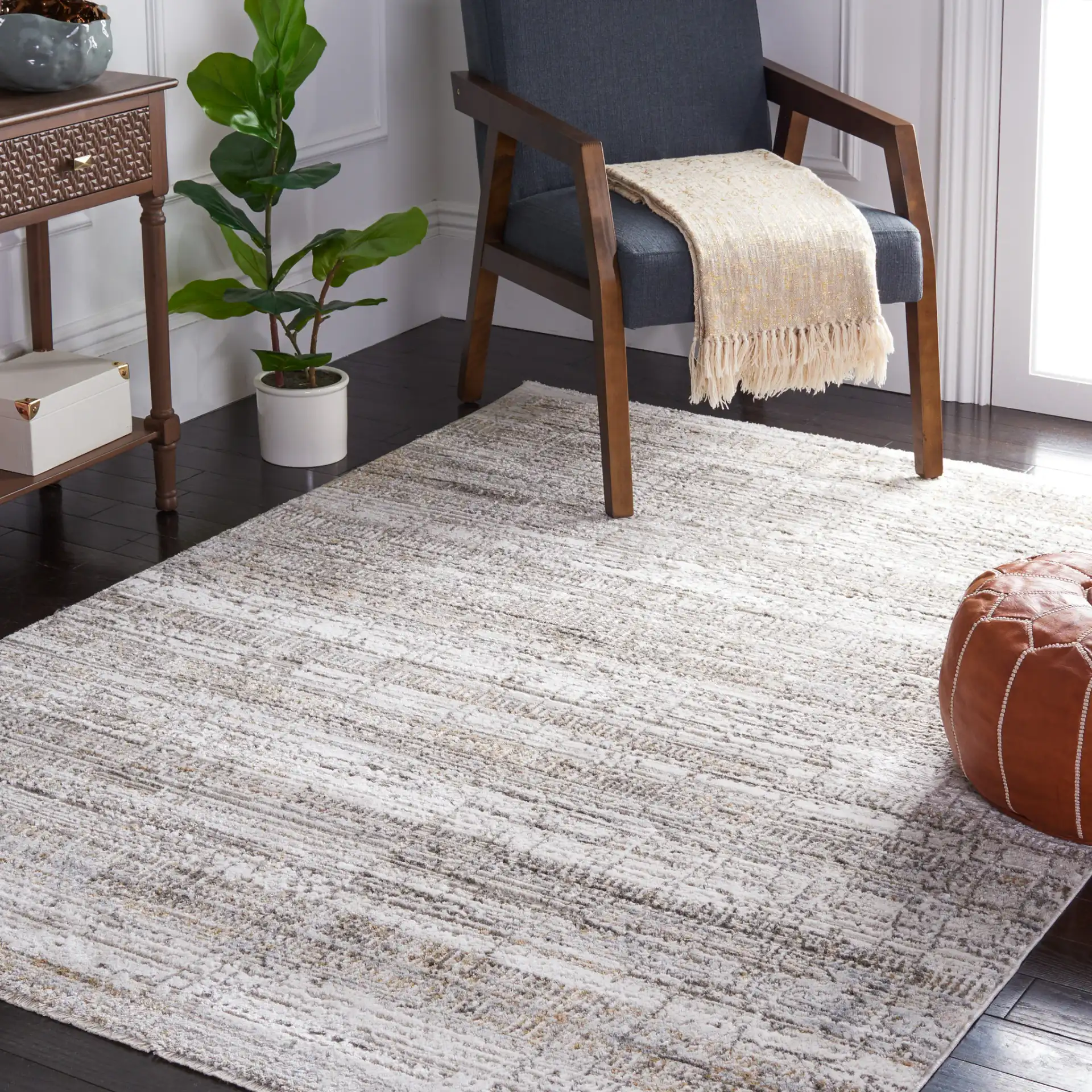 Princeton Distressed Grid Rug in Ivory / Gray in a styled room