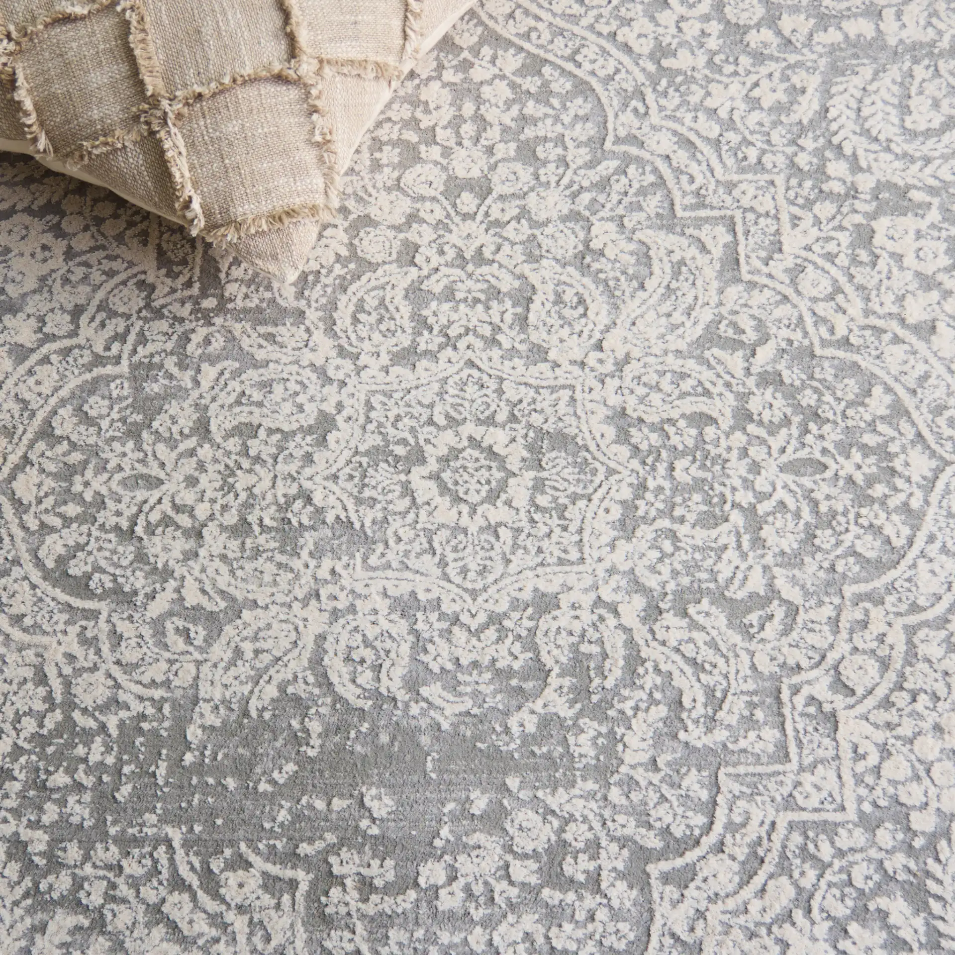 Princeton Distressed Panel Rug in Gray / Beige in a styled room