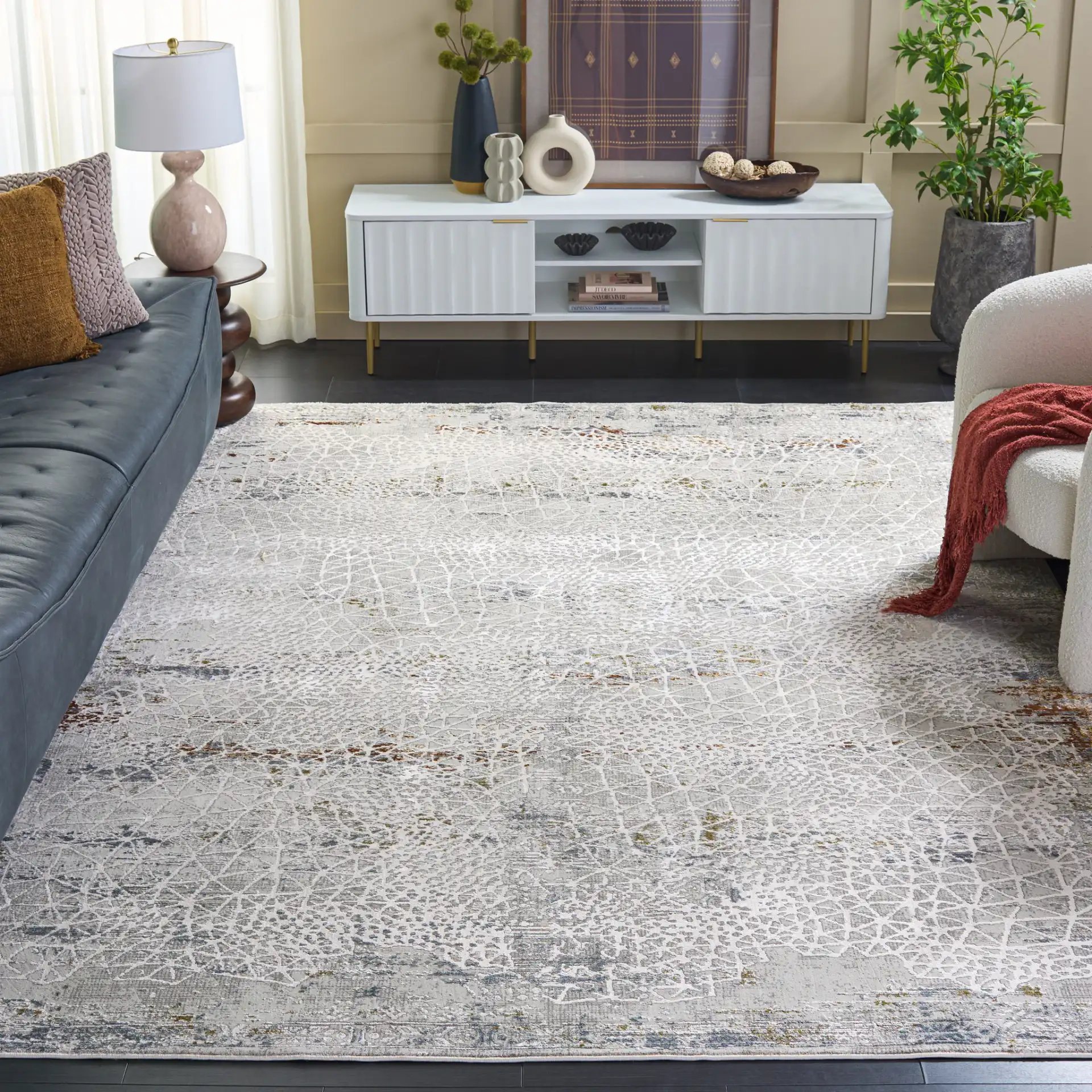 Princeton Abstract Bordered Rug in Light Beige in a styled room