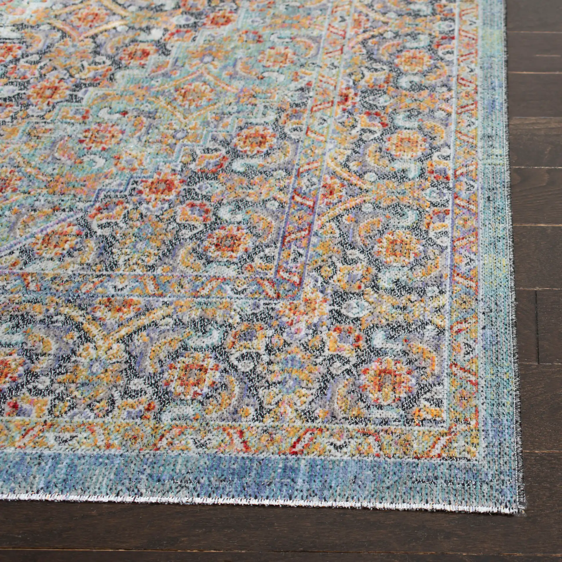 Provance Bordered Medallion Rug in Blue / Yellow in a styled room