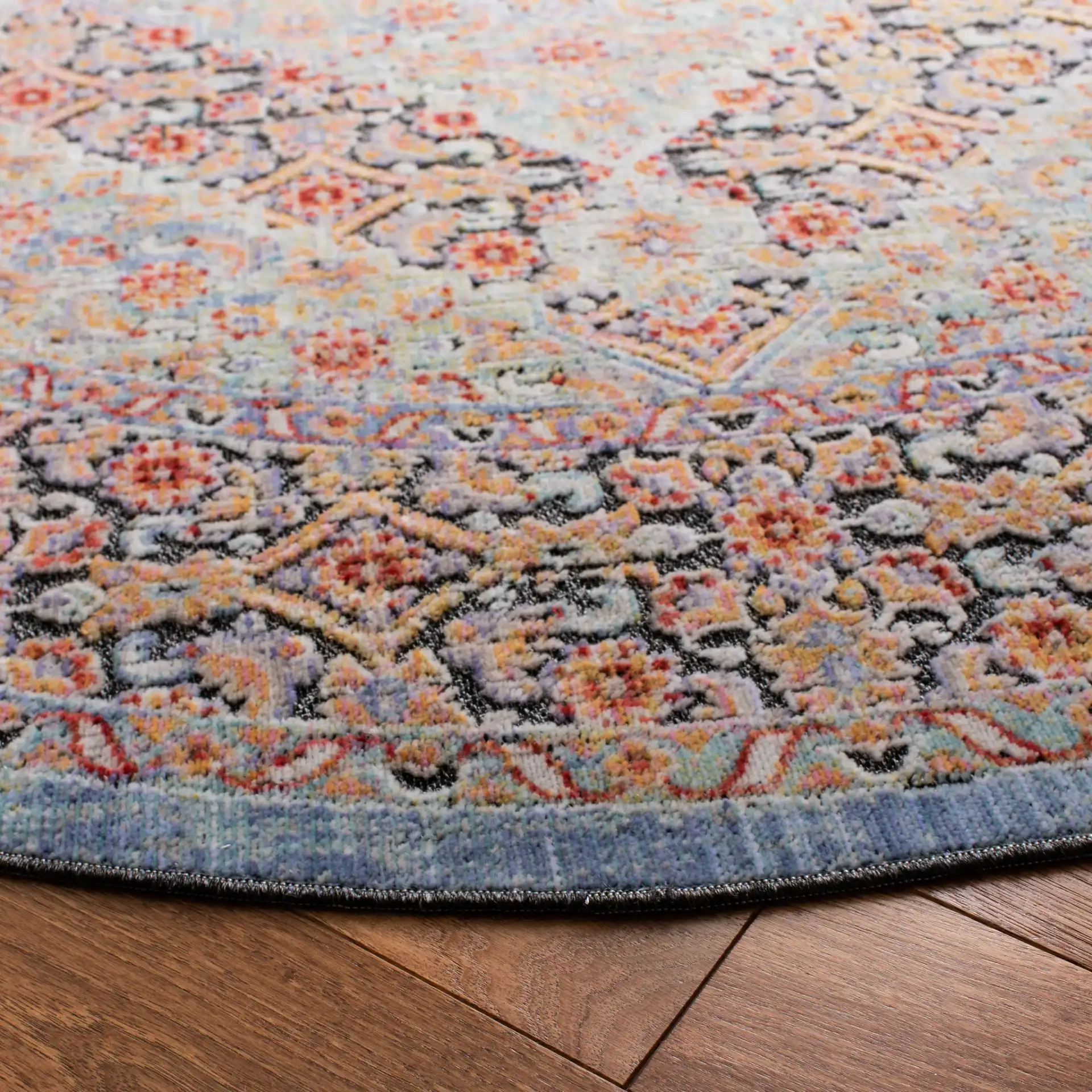 Provance Bordered Medallion Rug in Blue / Yellow in a styled room