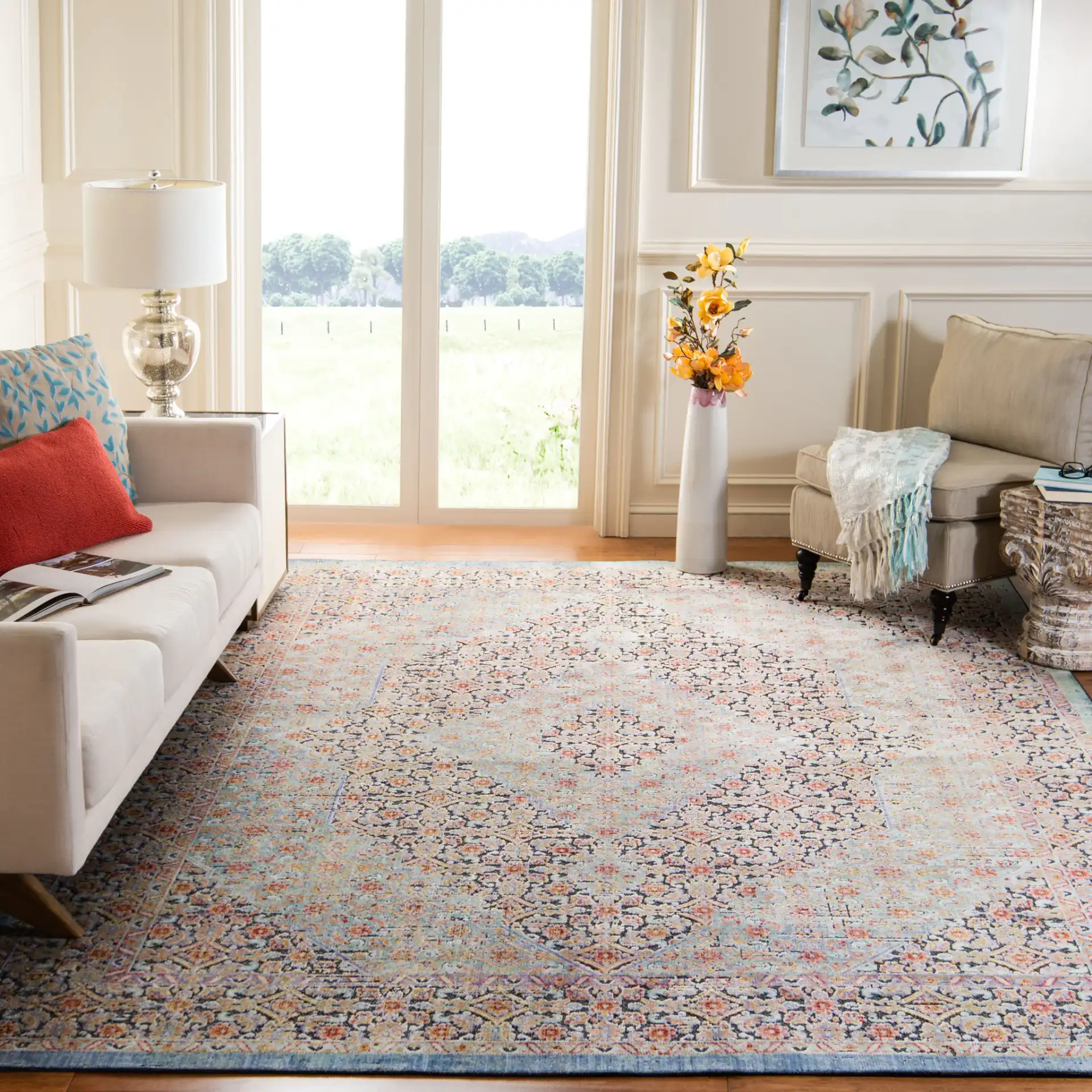 Provance Bordered Medallion Rug in Blue / Yellow in a styled room