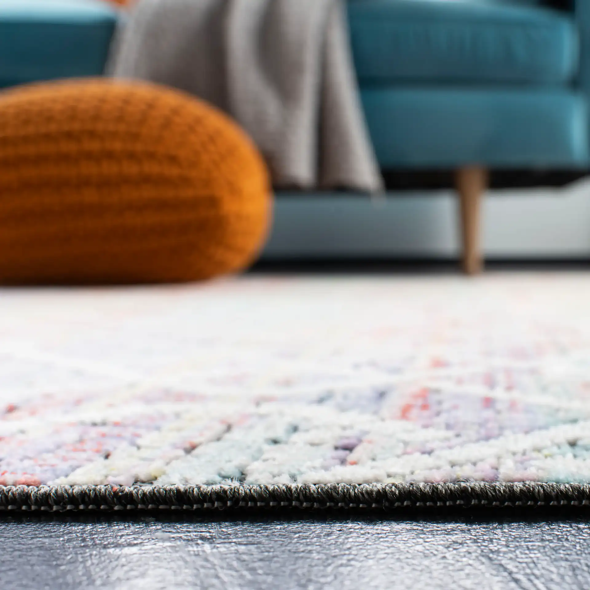 Provance Interlocking Trellis Rug in Cream / Orange in a styled room