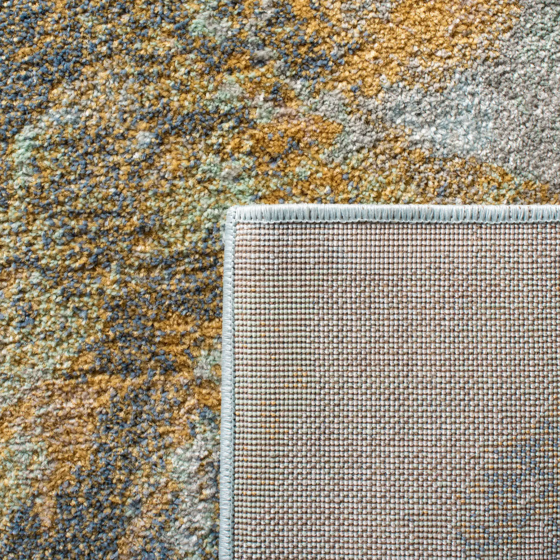 Prism Abstract Painterly Rug in Cream / Blue in a styled room